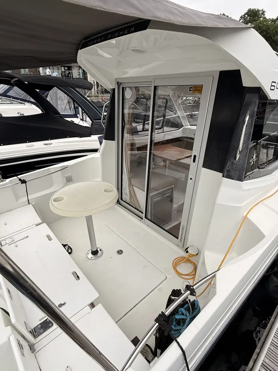 Aft cockpit with the folding table and sliding glass door into the saloon
