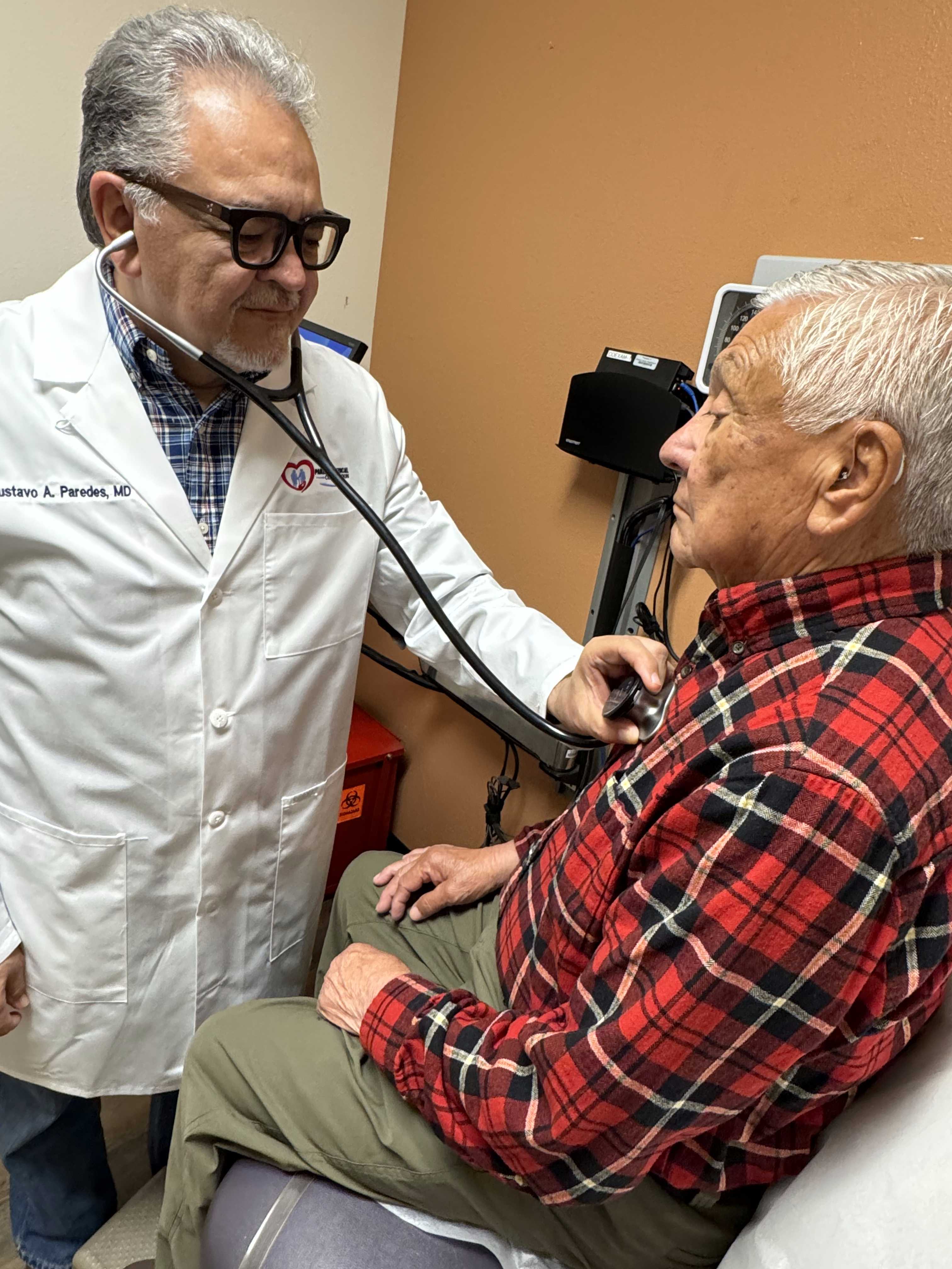 Dr. Paredes with a patient