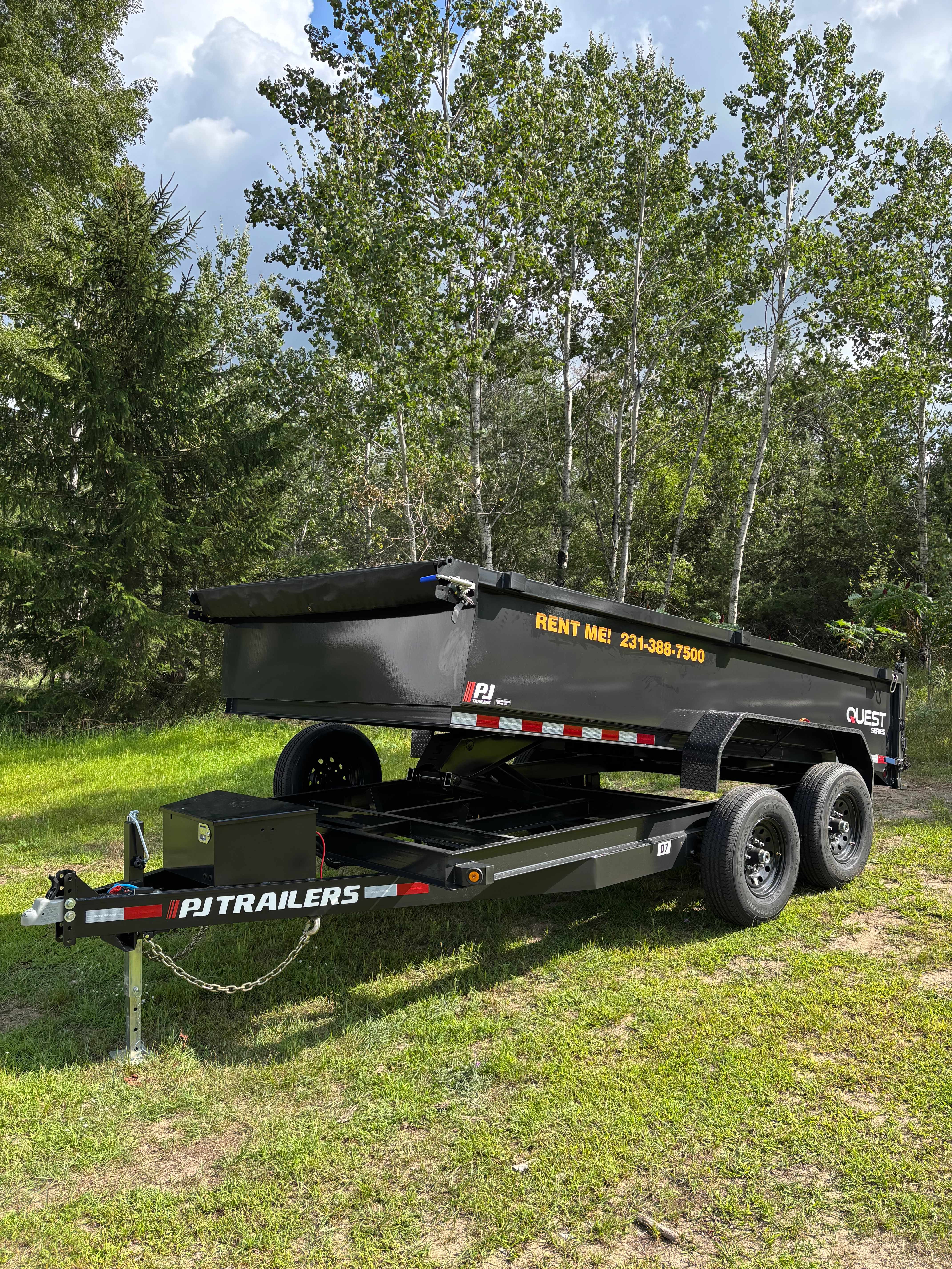 Hydraulic dump trailer rental in Thompsonville, MI — 2026 PJ D7 with bed raised