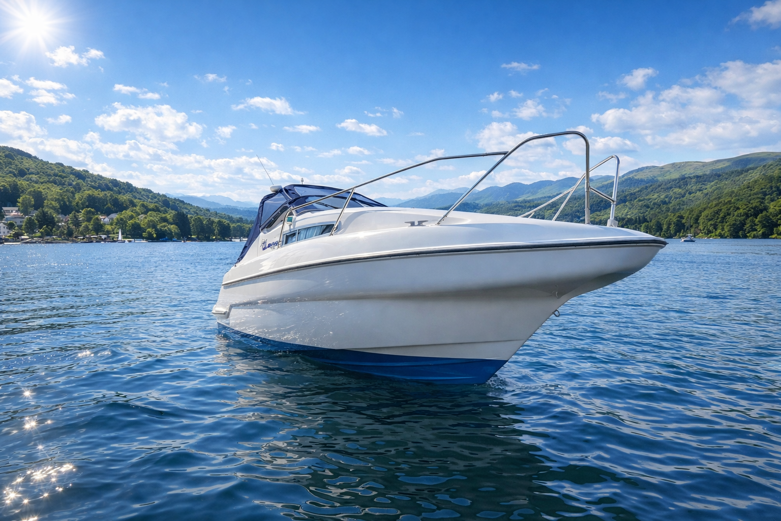 The white Sealine 240S cruiser on the calm waters of Lake Windermere
