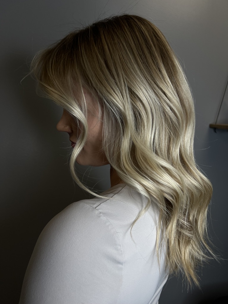 Blonde wavy hair styling