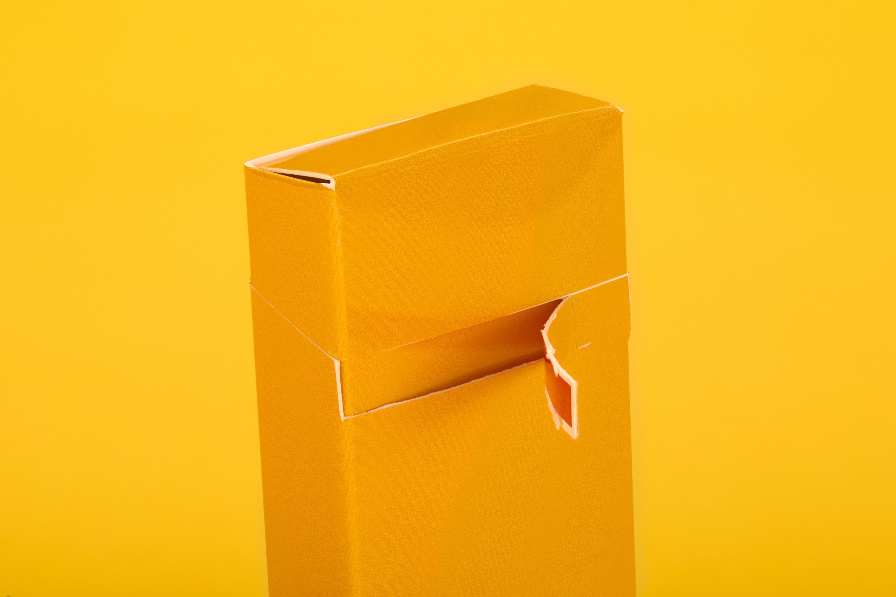 Peel N Tear box with top being peeled away