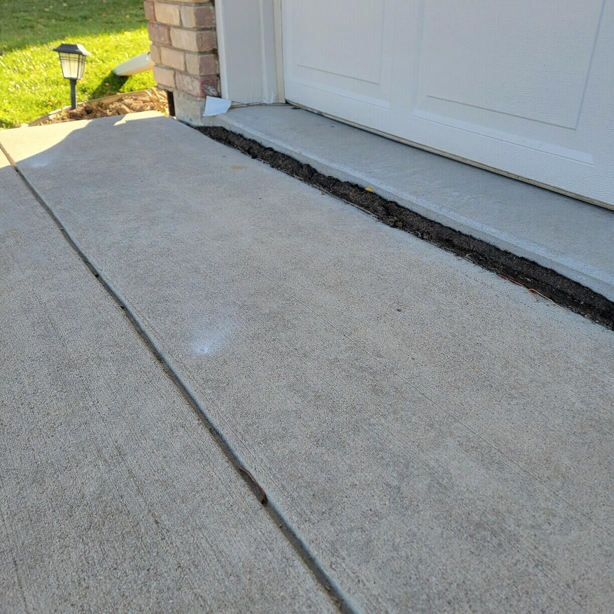 Garage Apron Joint Sealing - Before