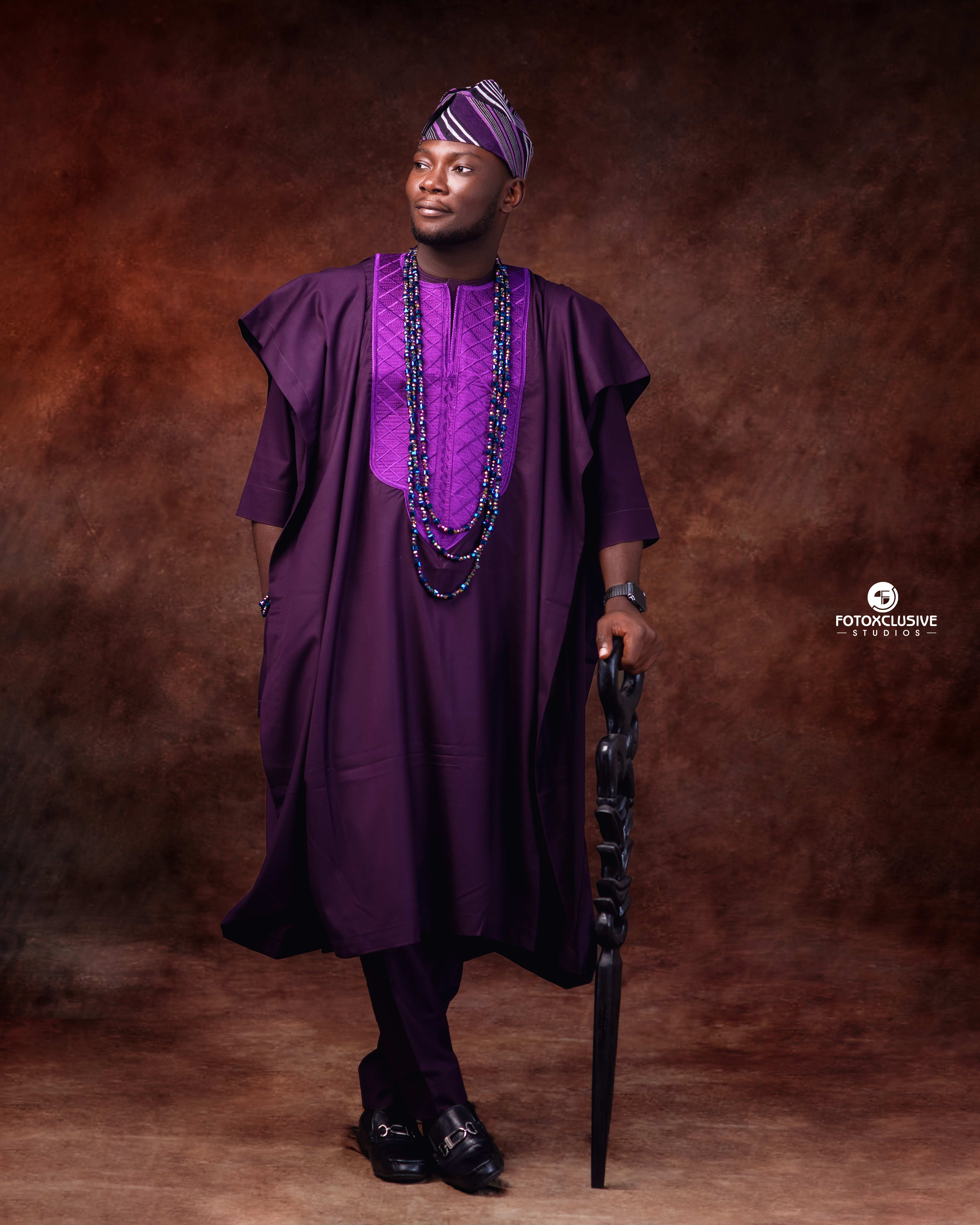 Kelechi - Solo portrait in traditional purple attire