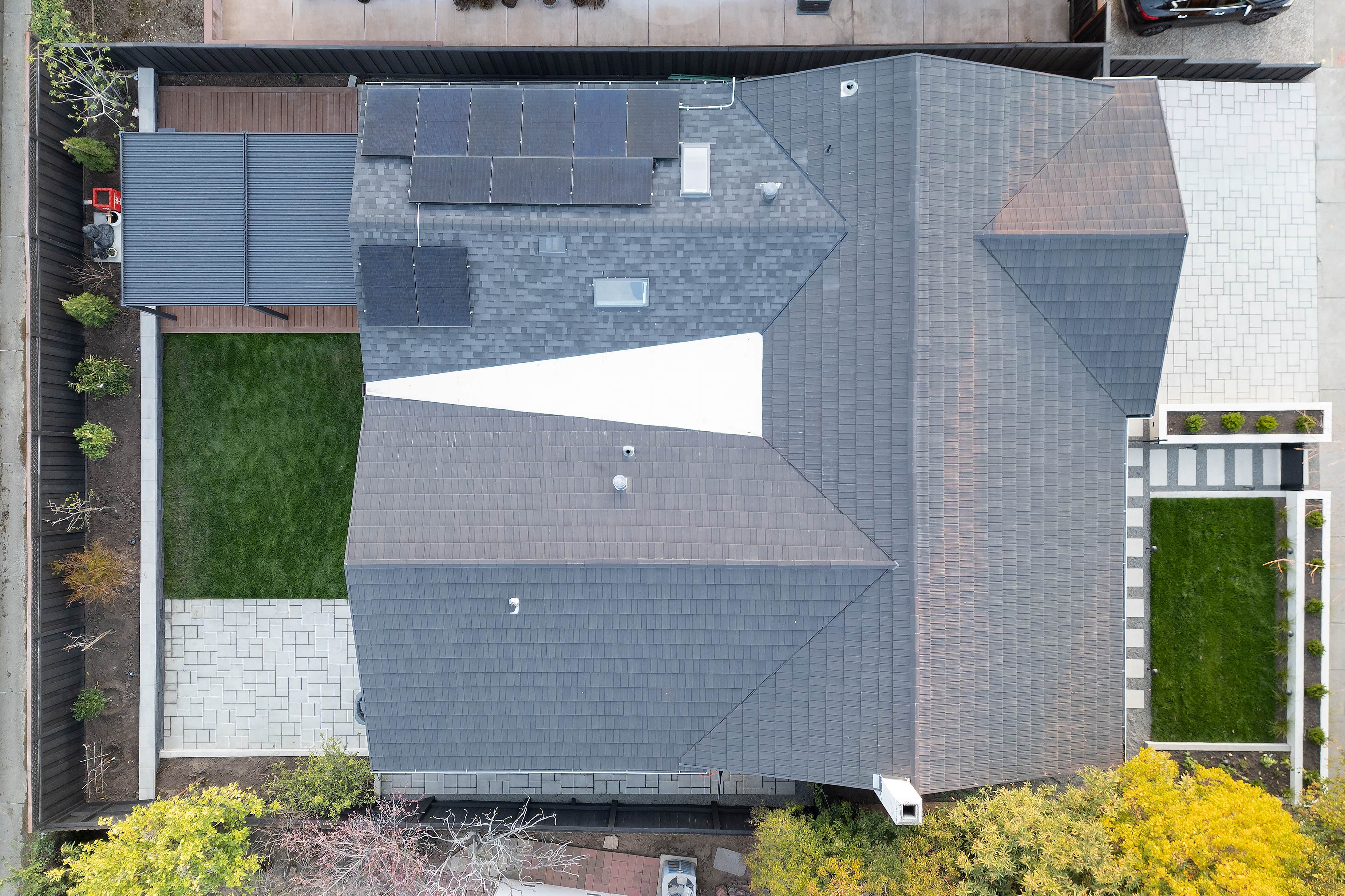 Aerial view of backyard layout and structure