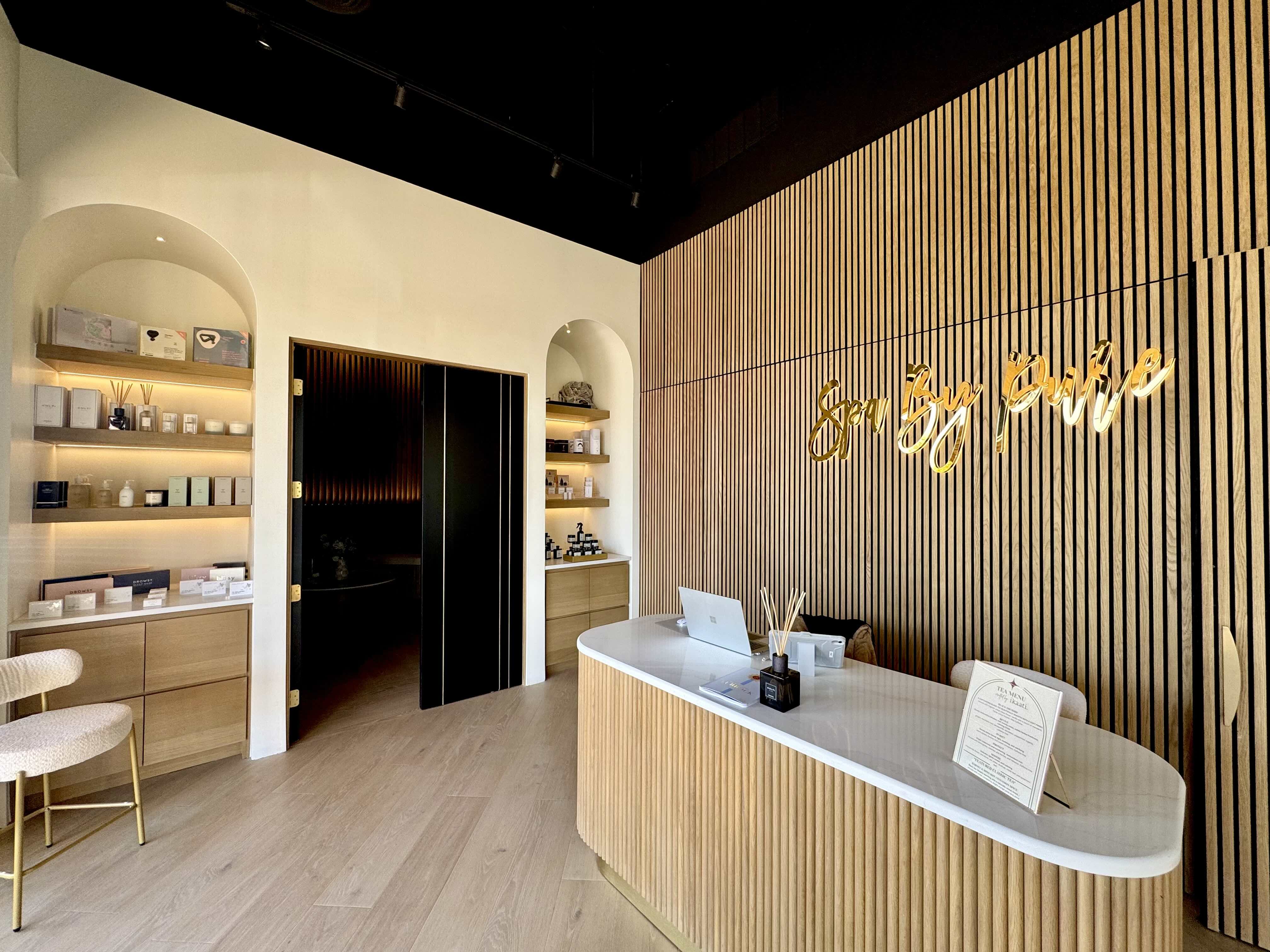 The Spa by Pure luxurious hallway with warm lighting and modern design