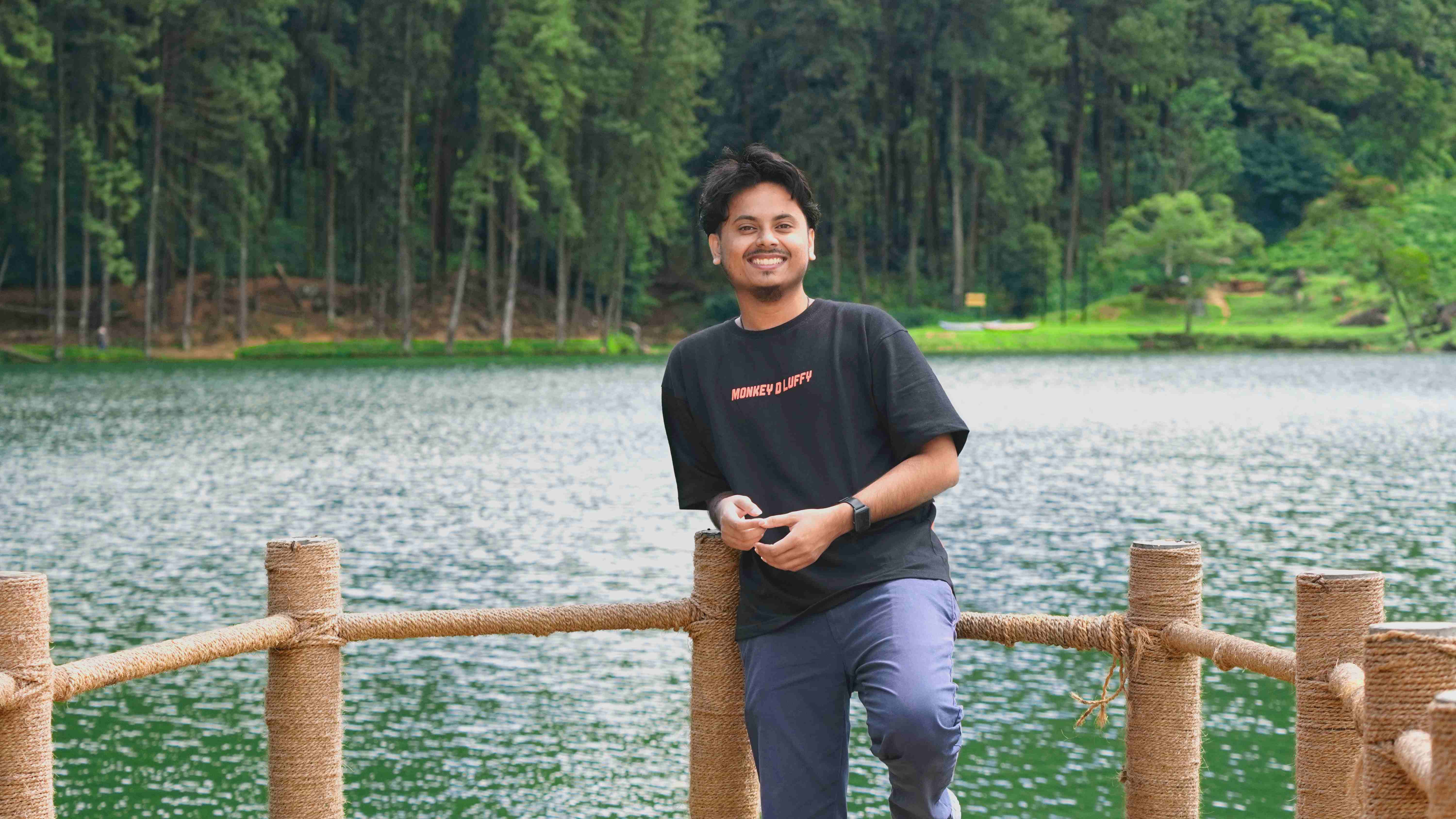Aaroophan Varatharajan beside a lake