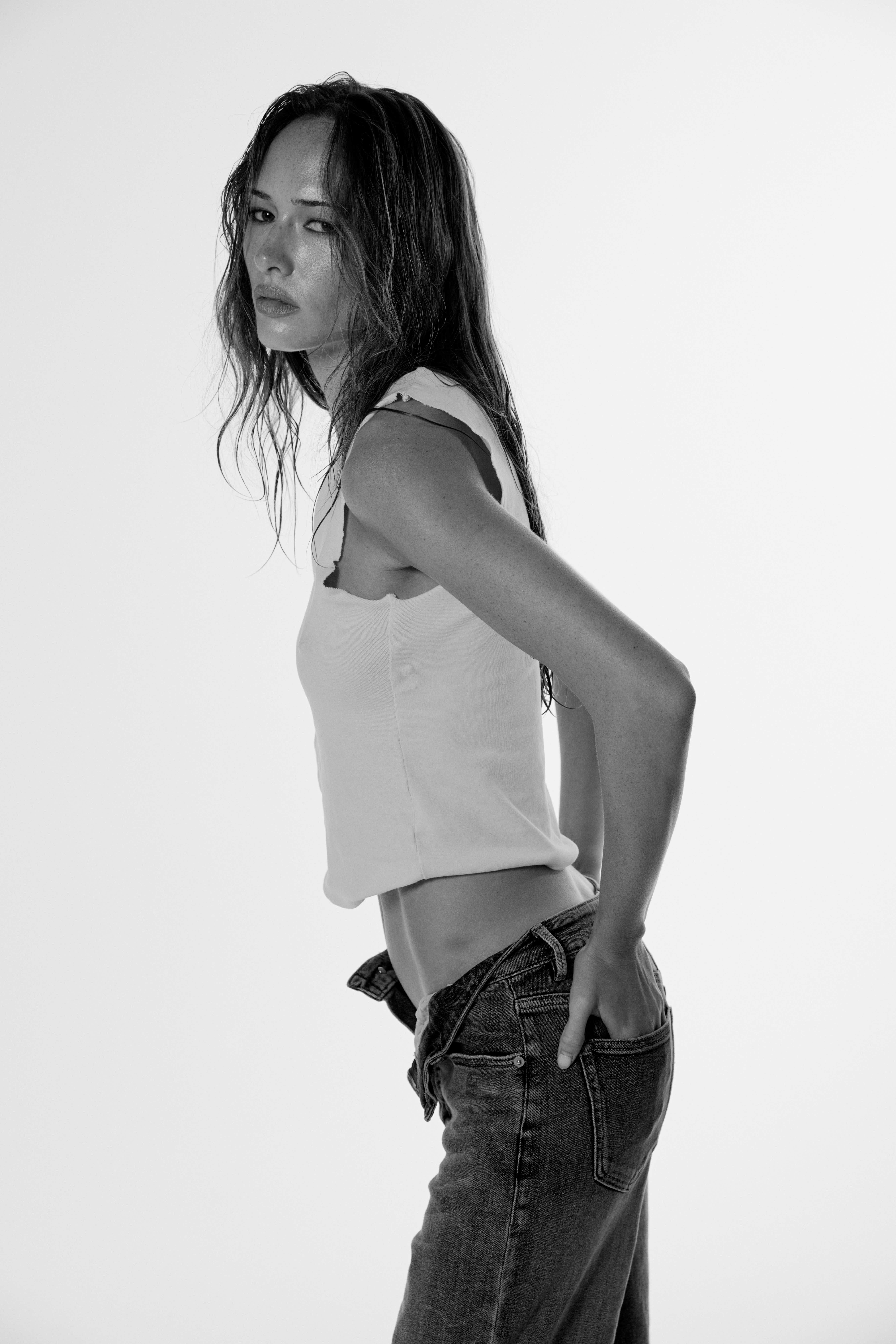 Gabby side profile looking over shoulder black and white