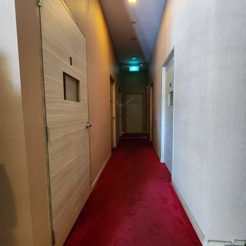 Spa hallway leading to private treatment rooms