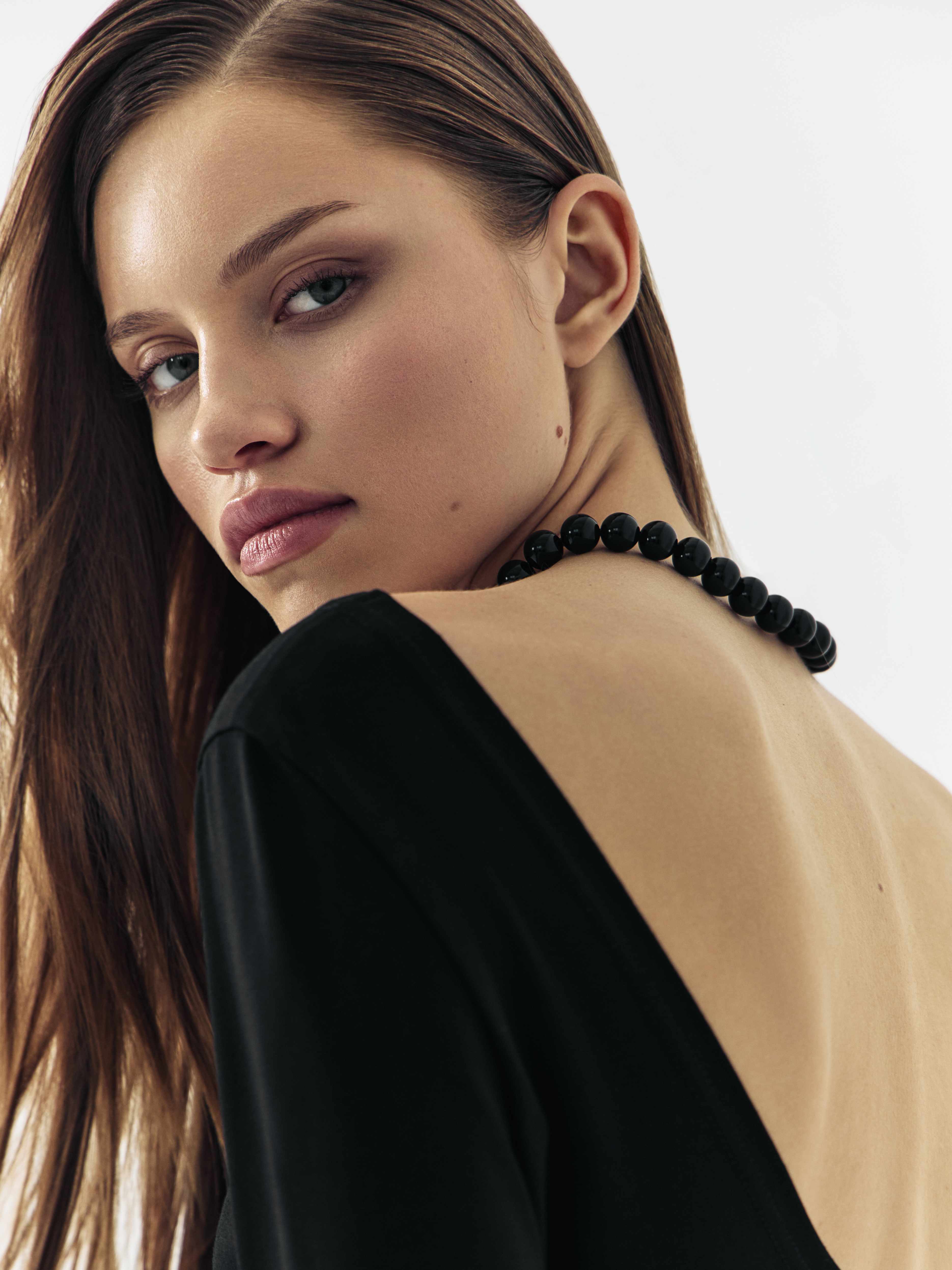Lookbook portrait after retouching — polished, vibrant result