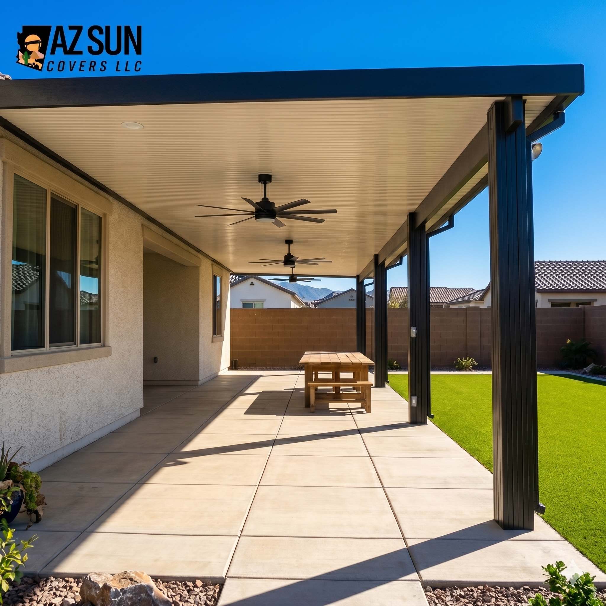 Solid-roof attached patio cover with dual ceiling fans