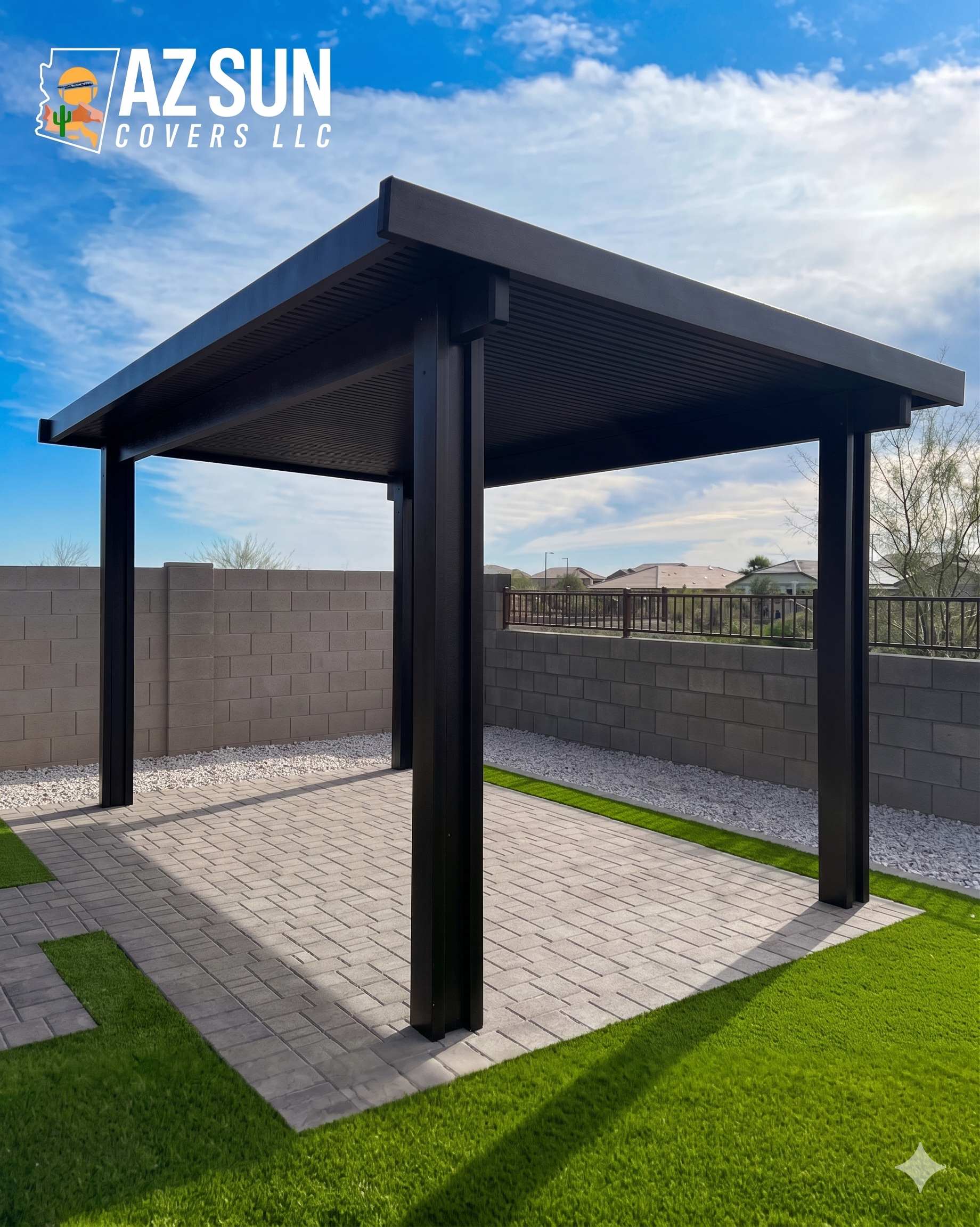 Freestanding dark pergola on paver patio with turf