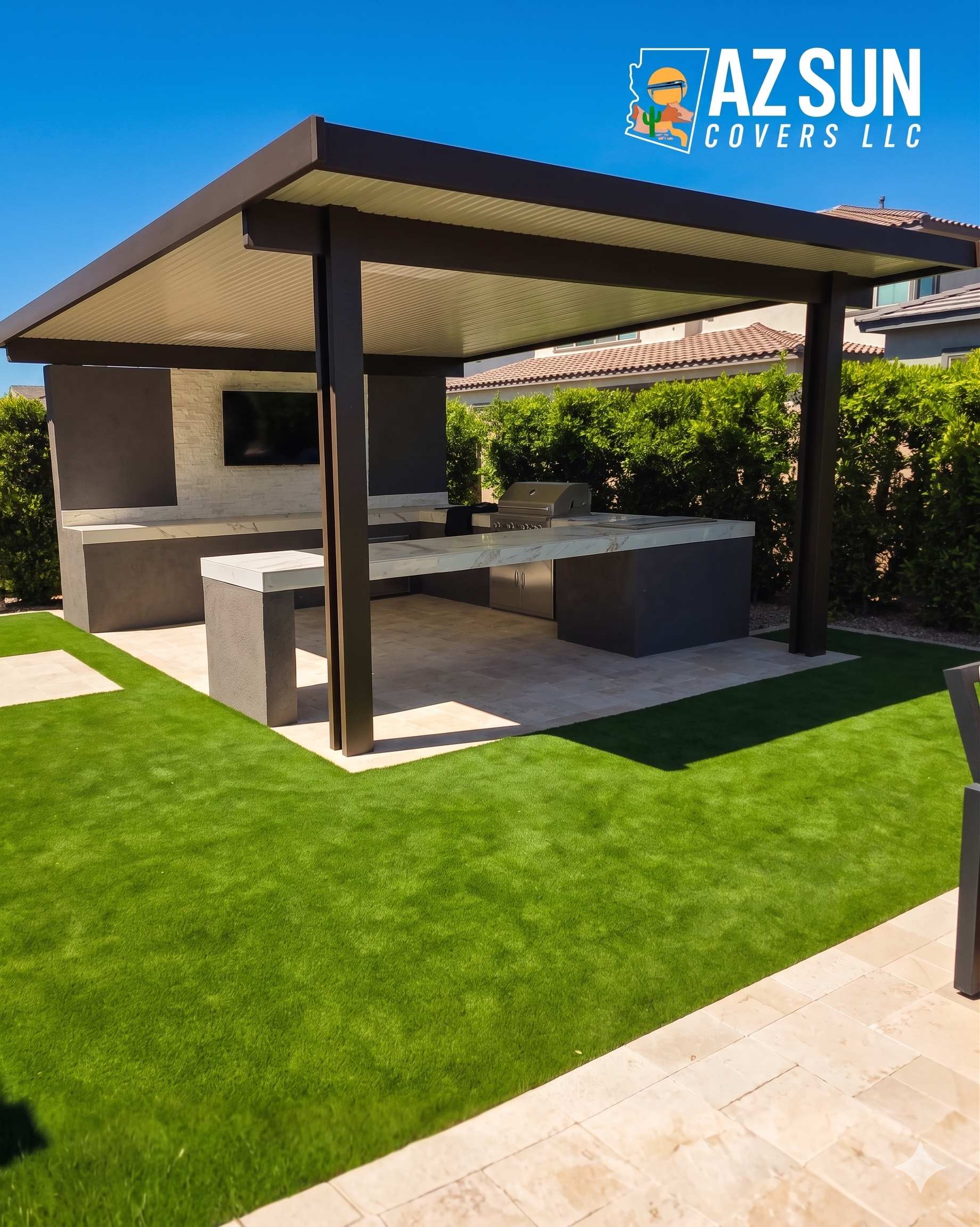 Solid-roof pergola over outdoor kitchen with grill