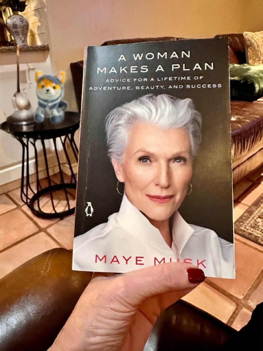 Maye Musk book with Asteroid plush in background