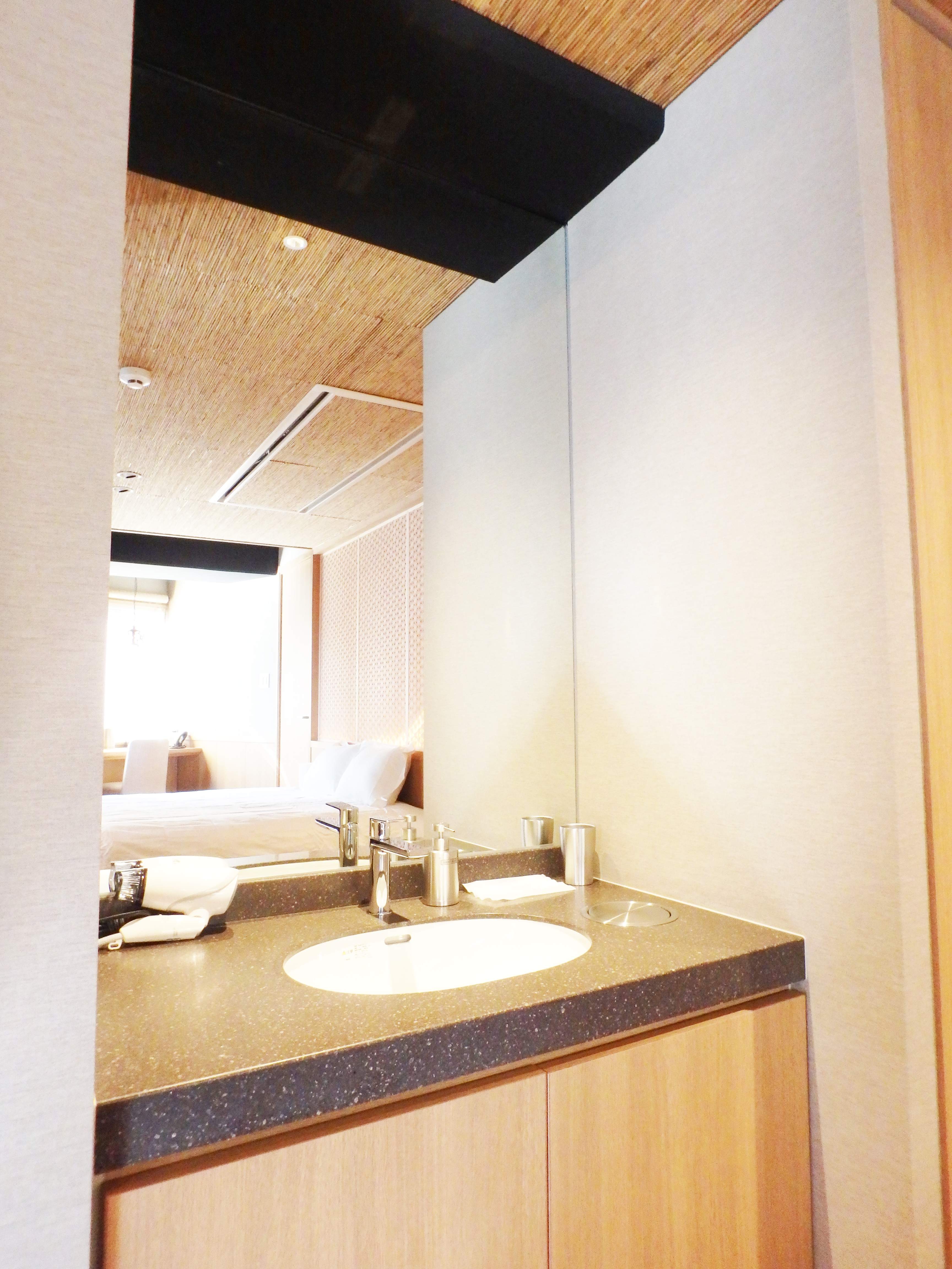 Vanity area with granite countertop