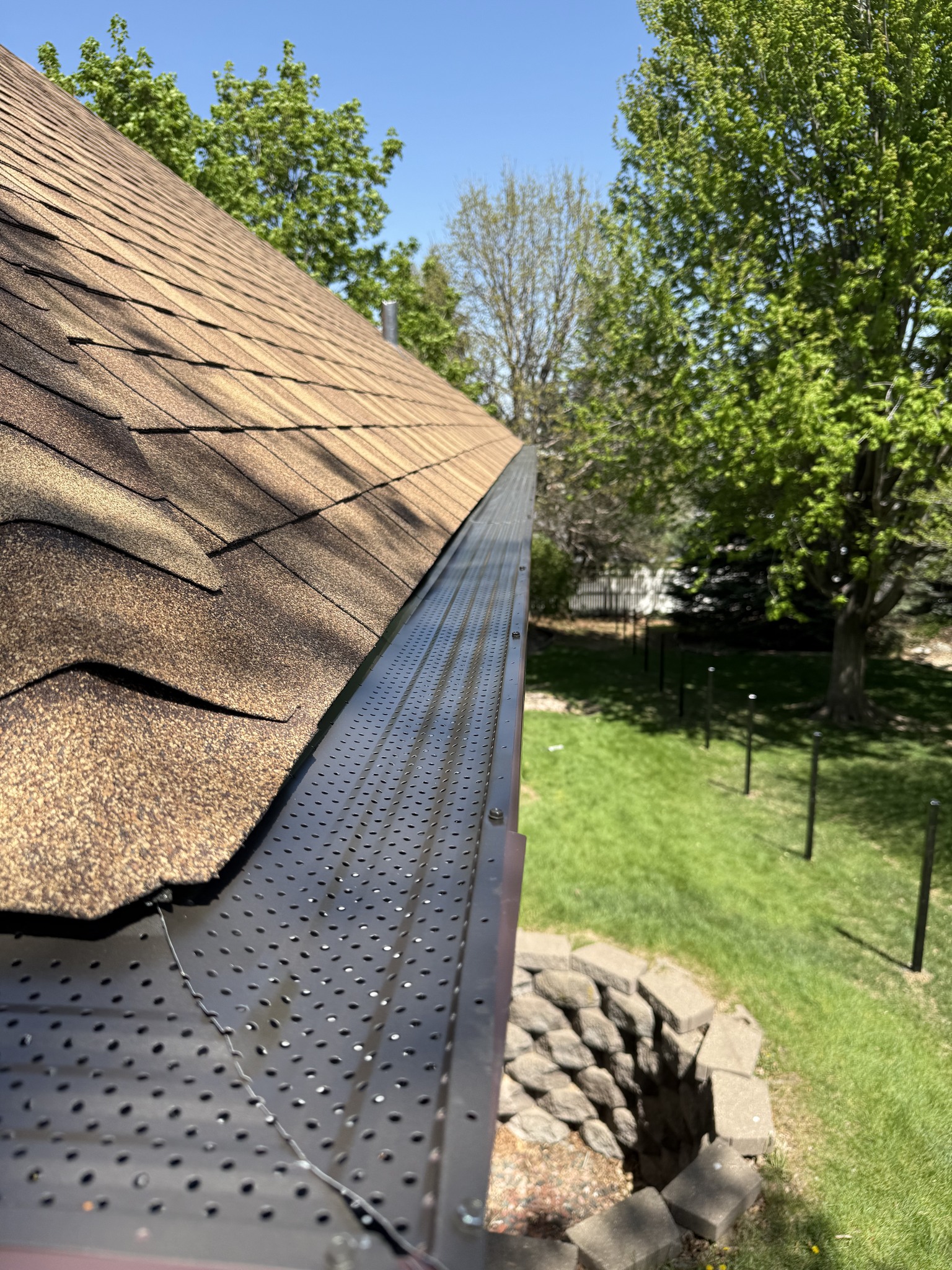 Gutters installation on Omaha home by Royalty Roofing and Siding