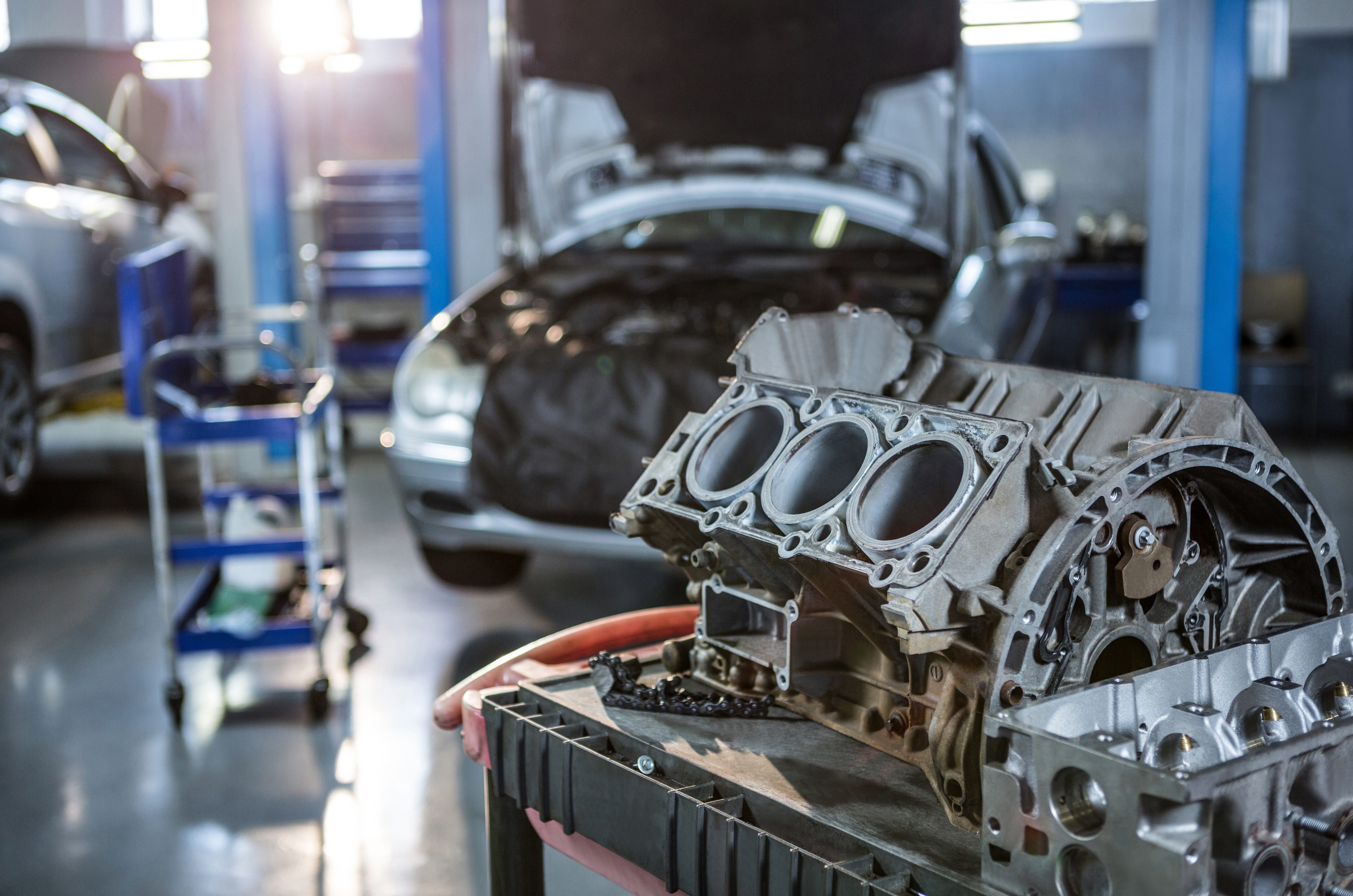 Professional auto repair garage with engine block
