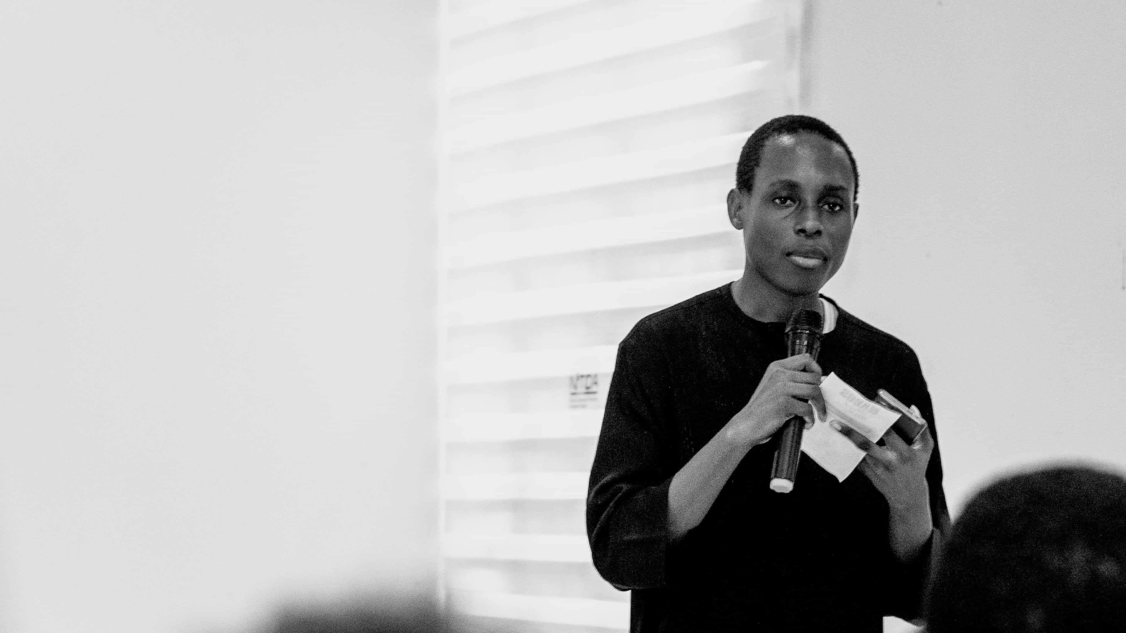 Nestor speaking at event