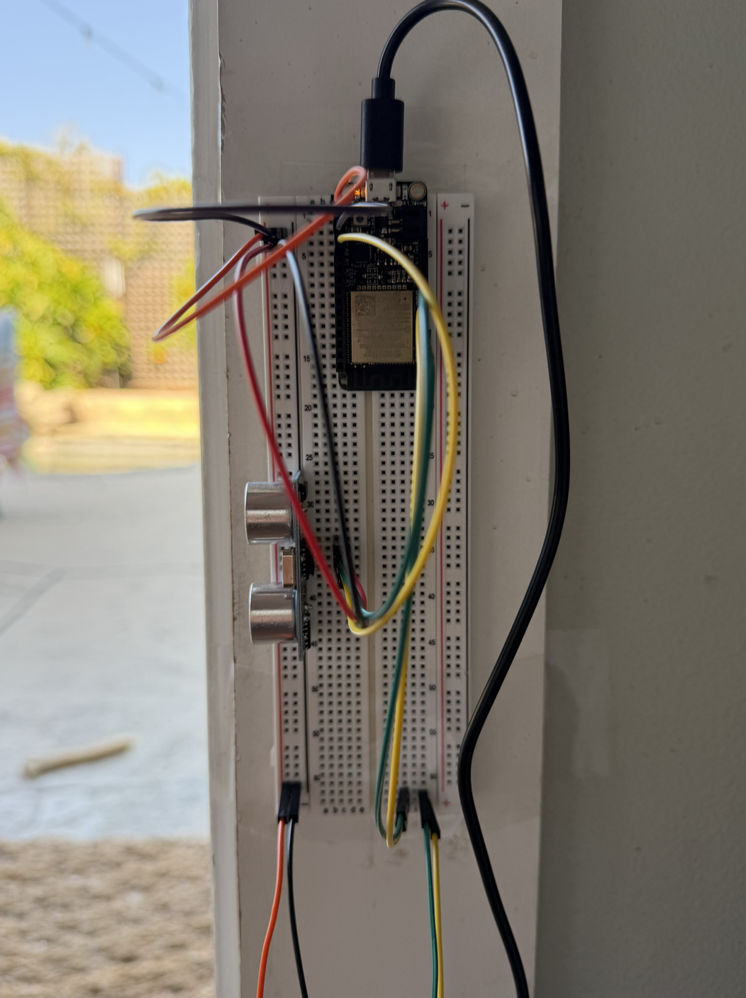 High sensor and ESP32 Feather microcontroller on the breadboard