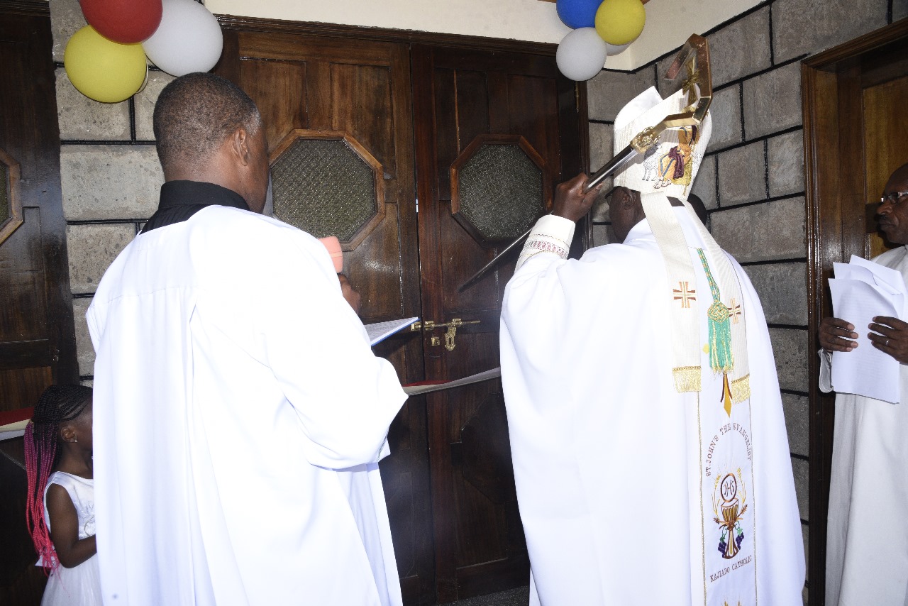 Clergy blessing the church doors, symbolizing the early development of the parish