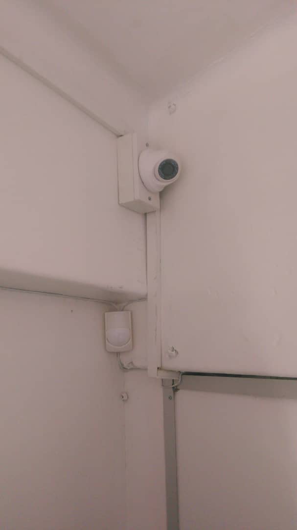 Indoor corner-mounted security camera