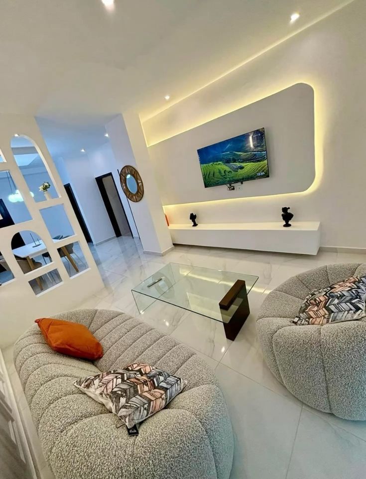 Modern white living room with LED lighting