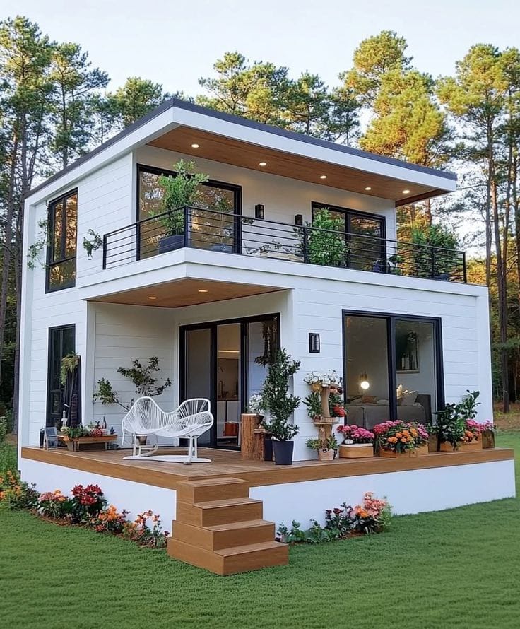 Modern white house with balcony and deck