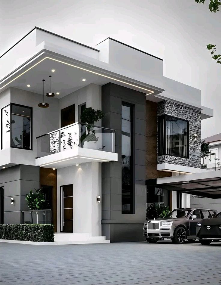 Modern black and white house with stone accent wall and luxury car