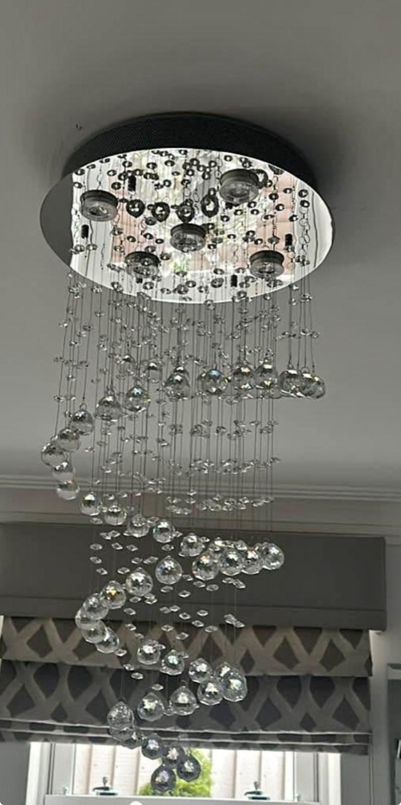 Luxury spiral crystal chandelier installation