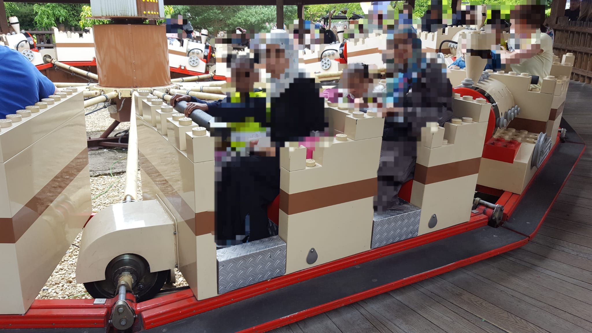 Children riding mini train attraction