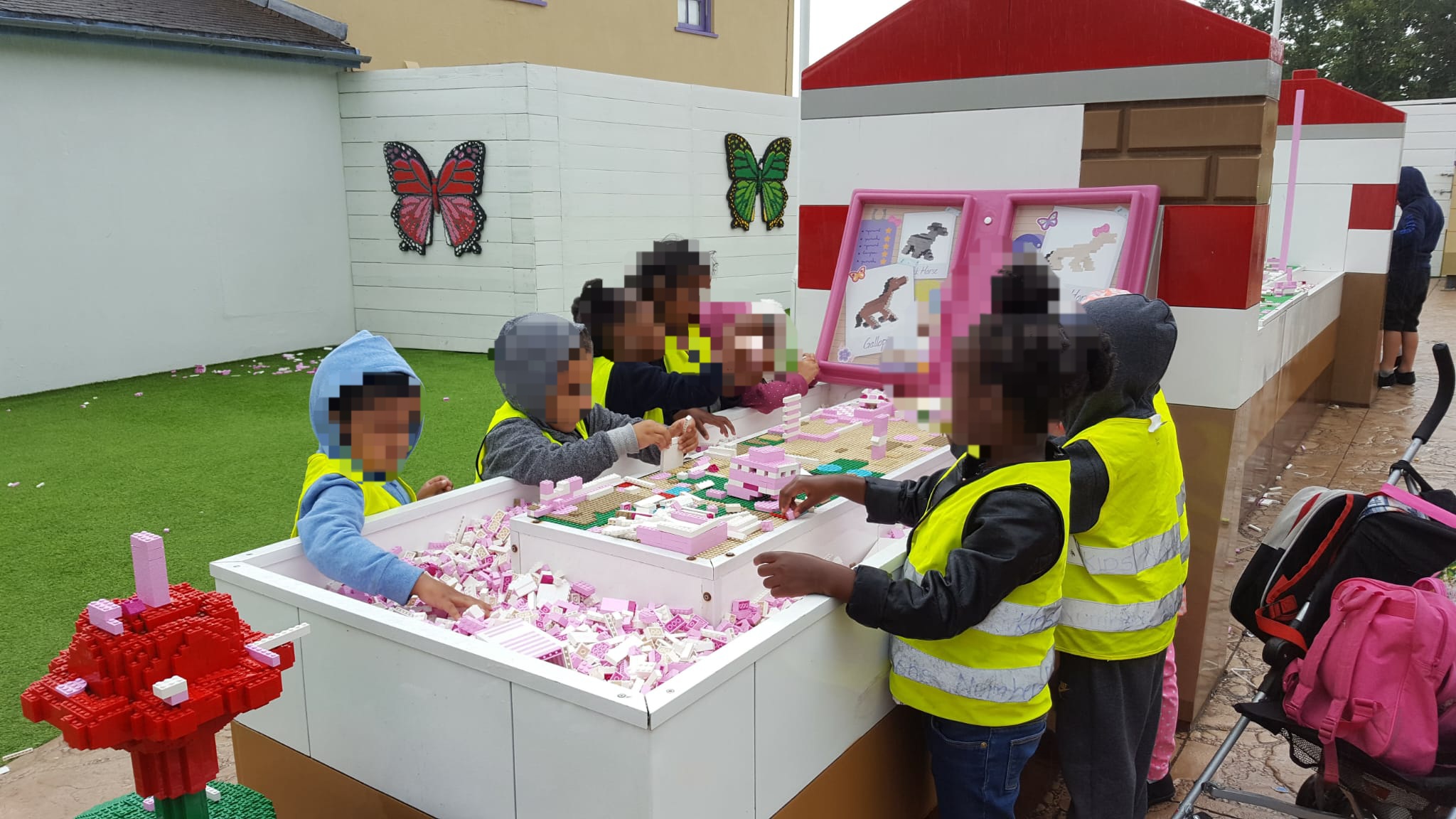 Children at interactive building and craft station