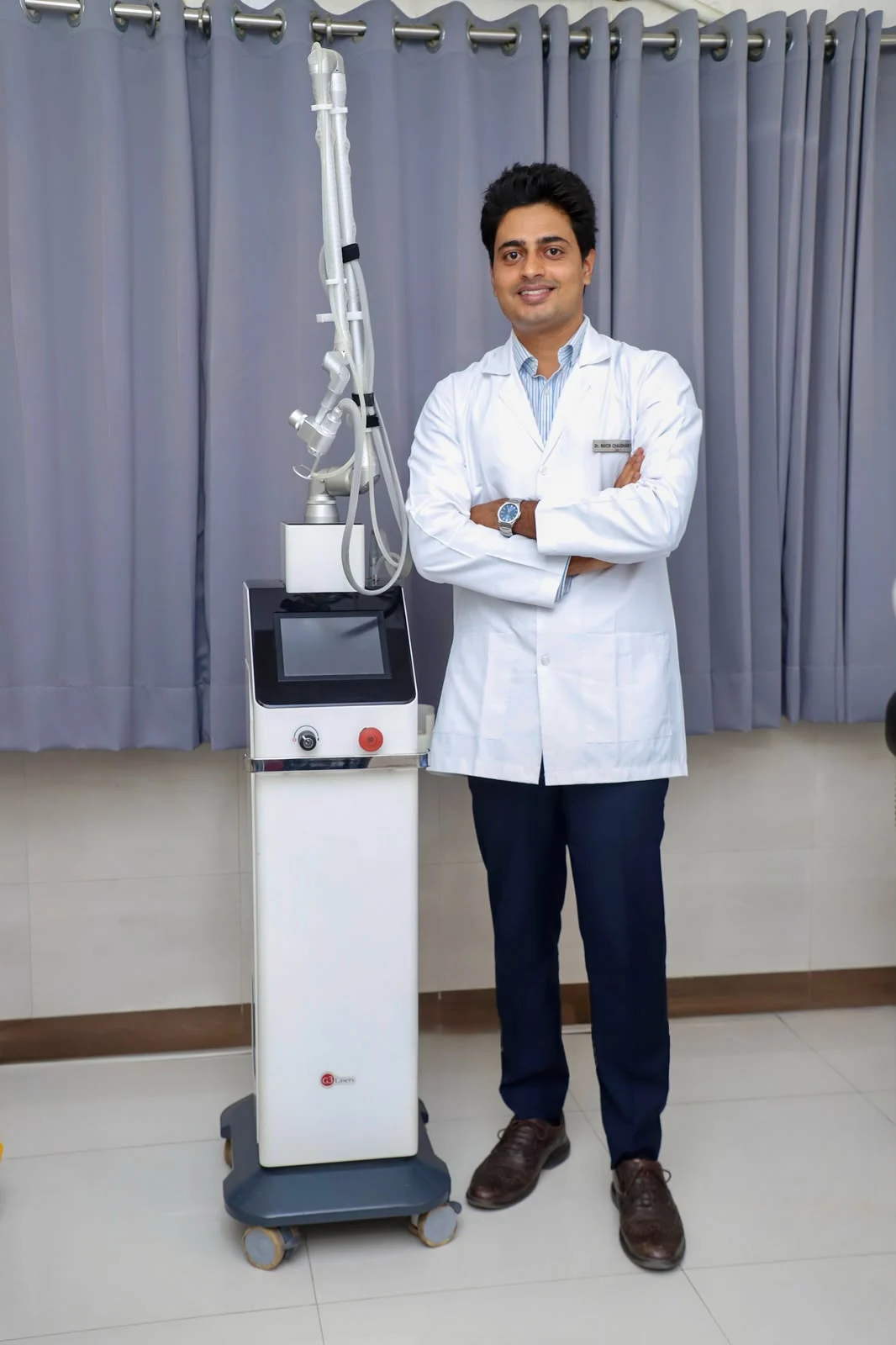 Dr. Navin with Fractional CO2 Laser Equipment