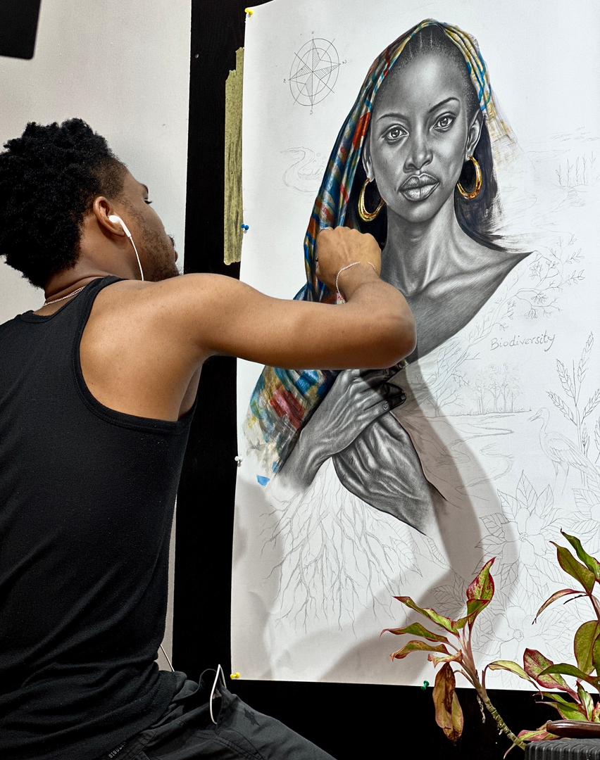 Ibim Cookey working on detailed portrait