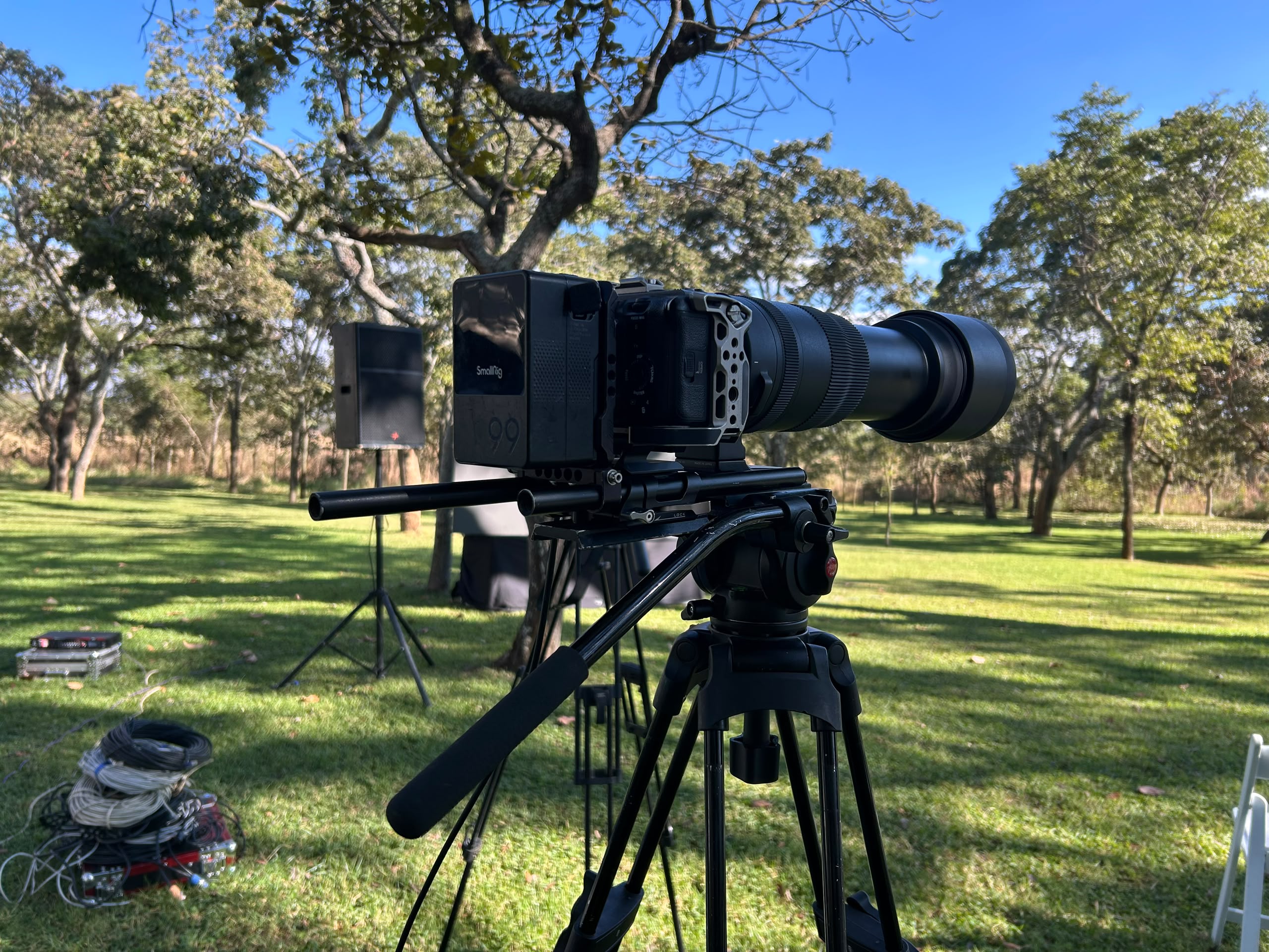Professional outdoor video production with cinema camera rig and monitoring equipment