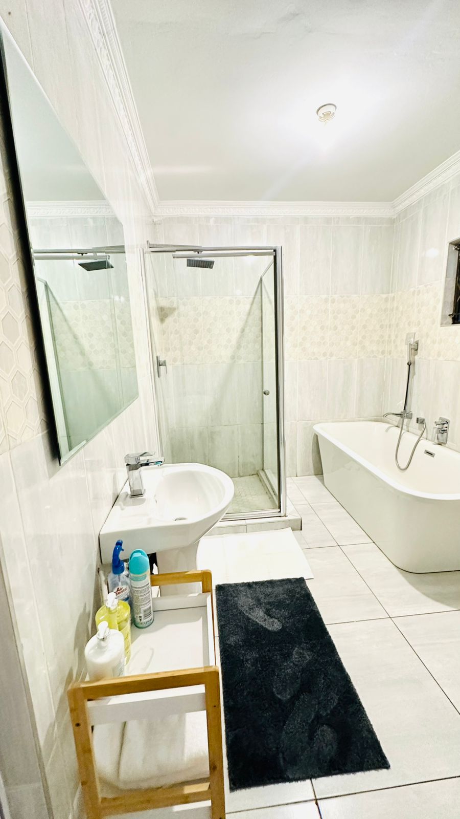 Spacious bathroom with bathtub