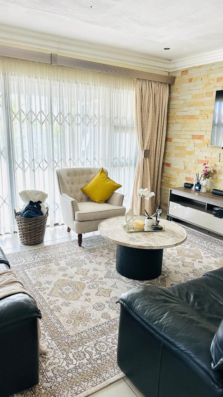 Lounge corner with feature armchair and coffee table