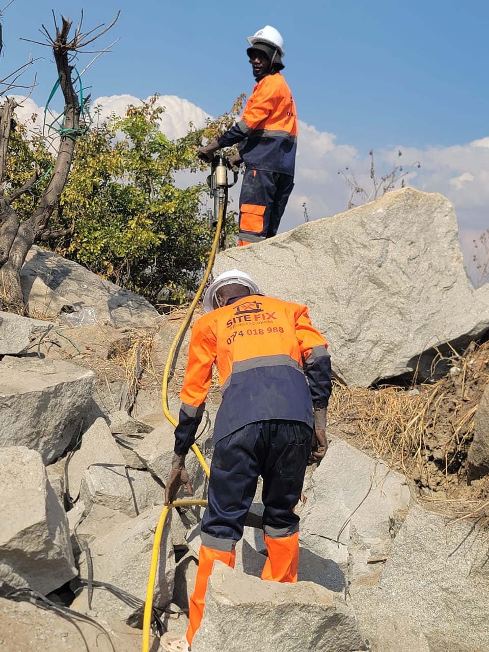 SiteFix team carrying out rock drilling