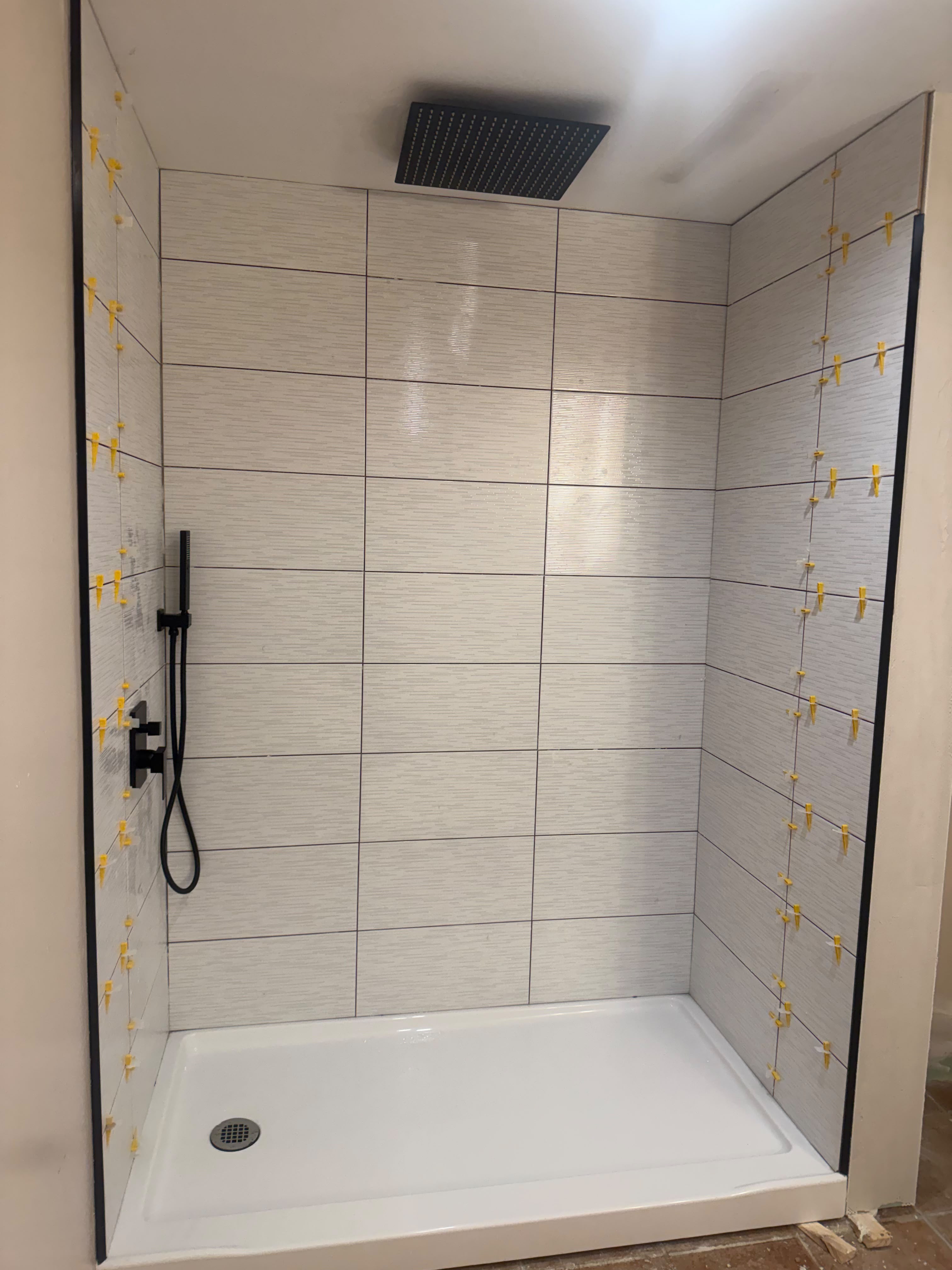 Precision tilework for a modern shower finish