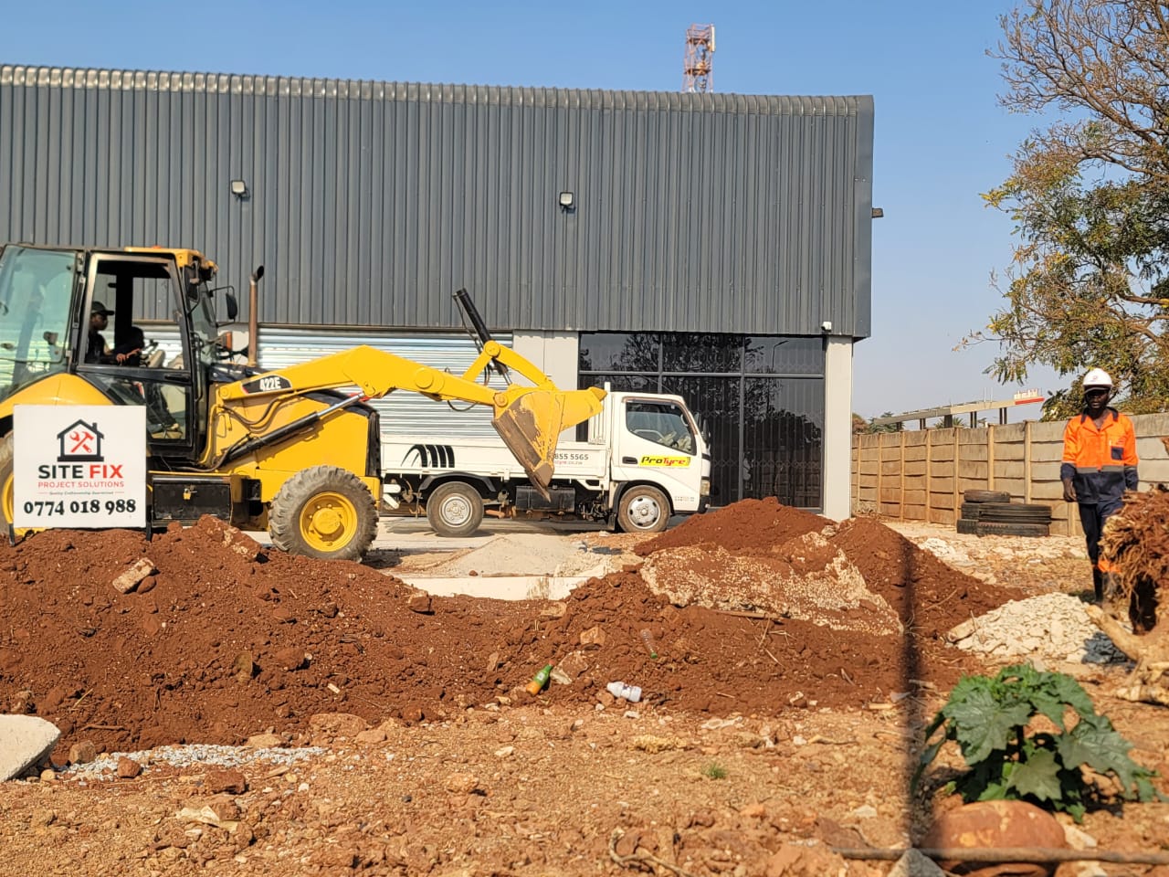 SiteFix earthmoving machinery on a construction site