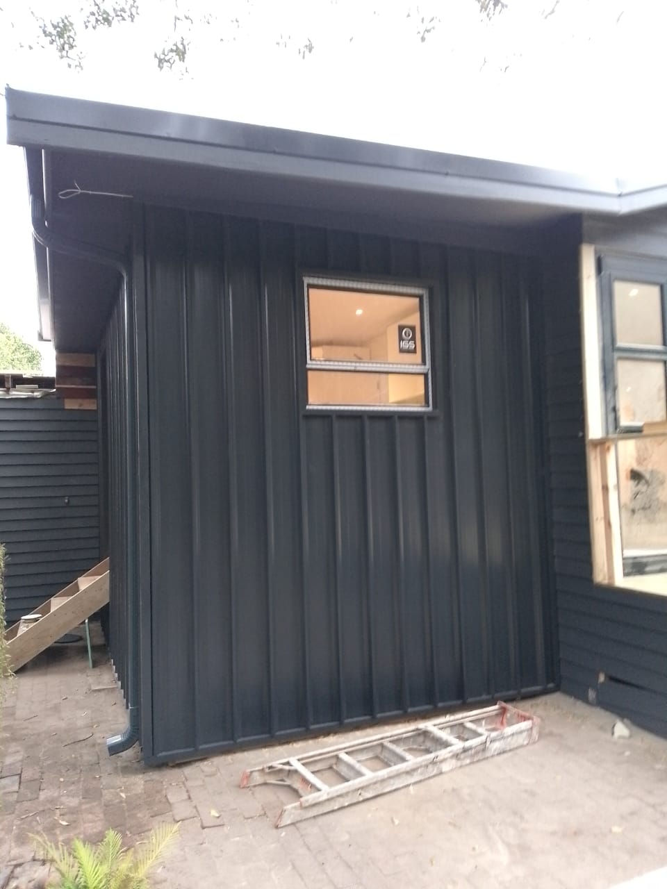 Dark exterior cladding renovation