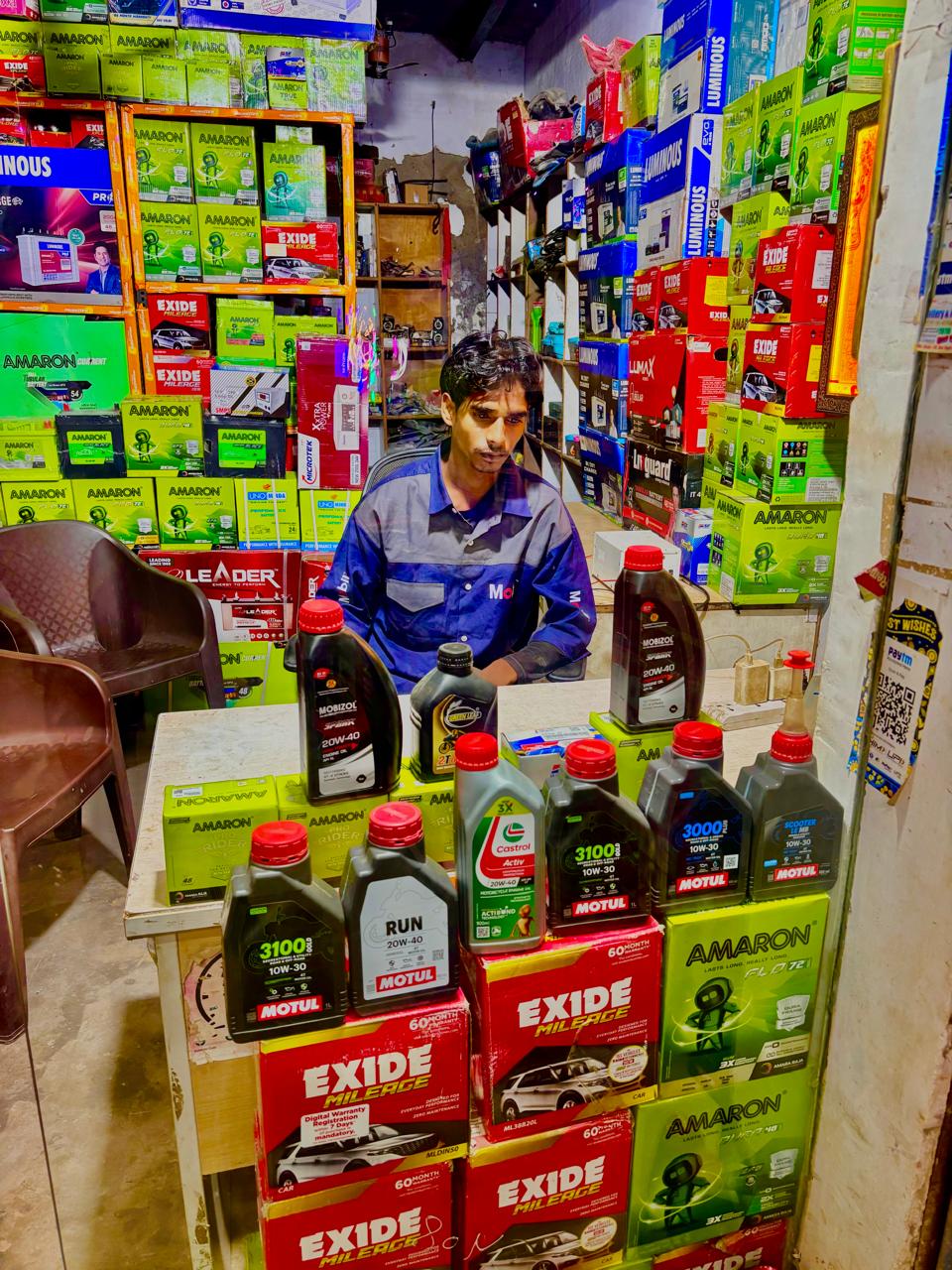 Amaron and Exide batteries with engine oils at Jiya Auto Service Centre