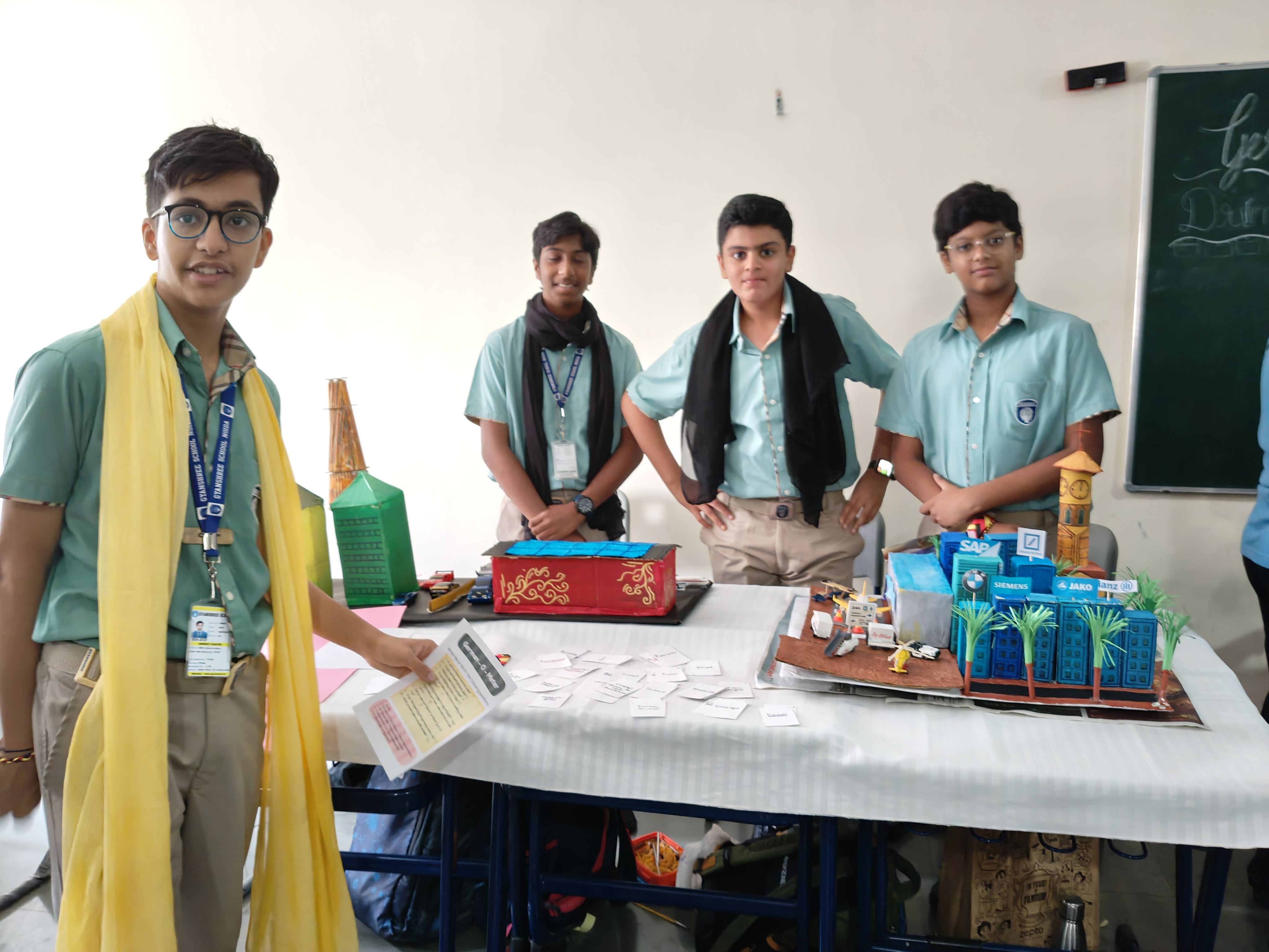 Akshat with a student team at an event
