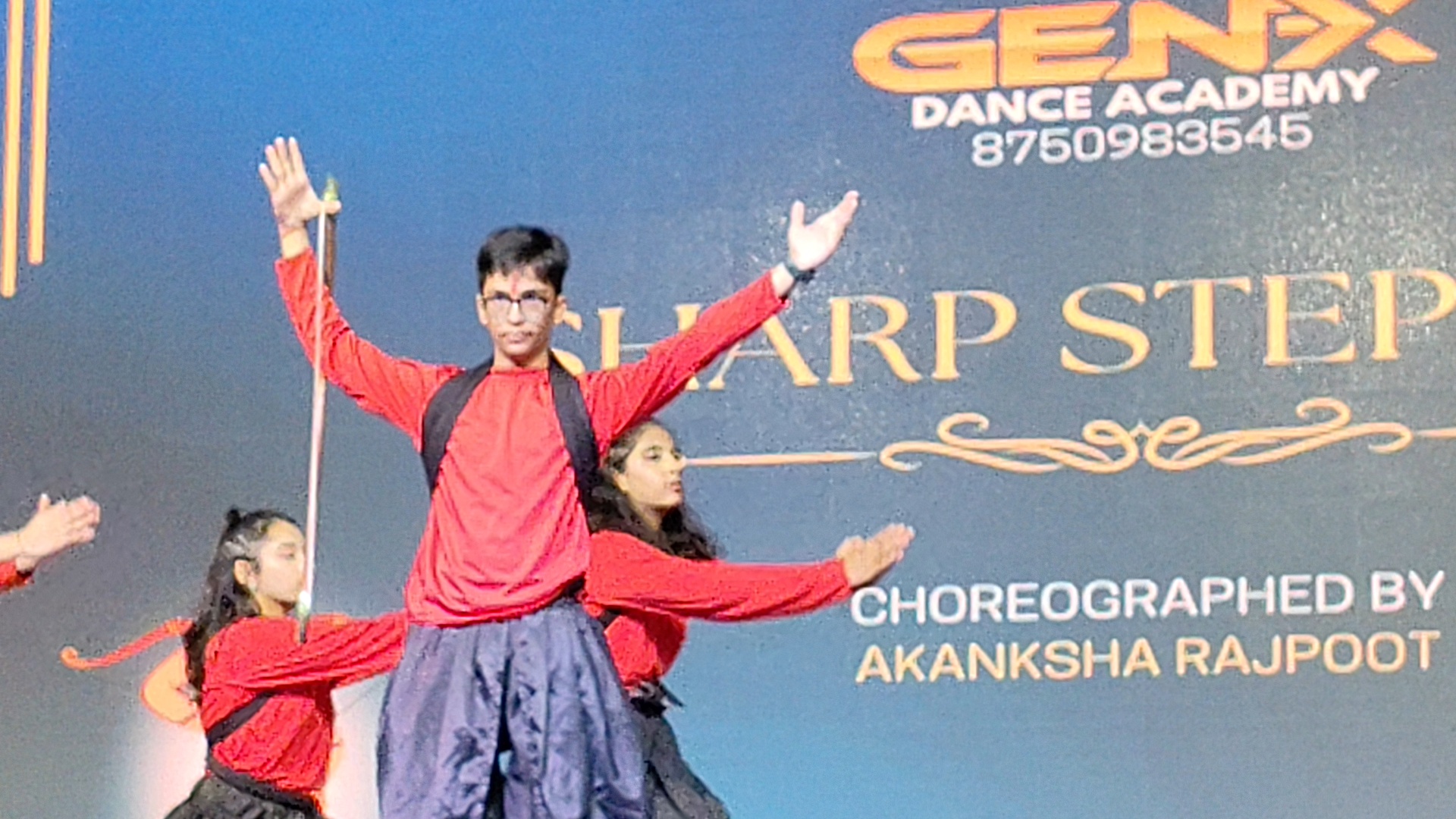 Akshat performing on stage