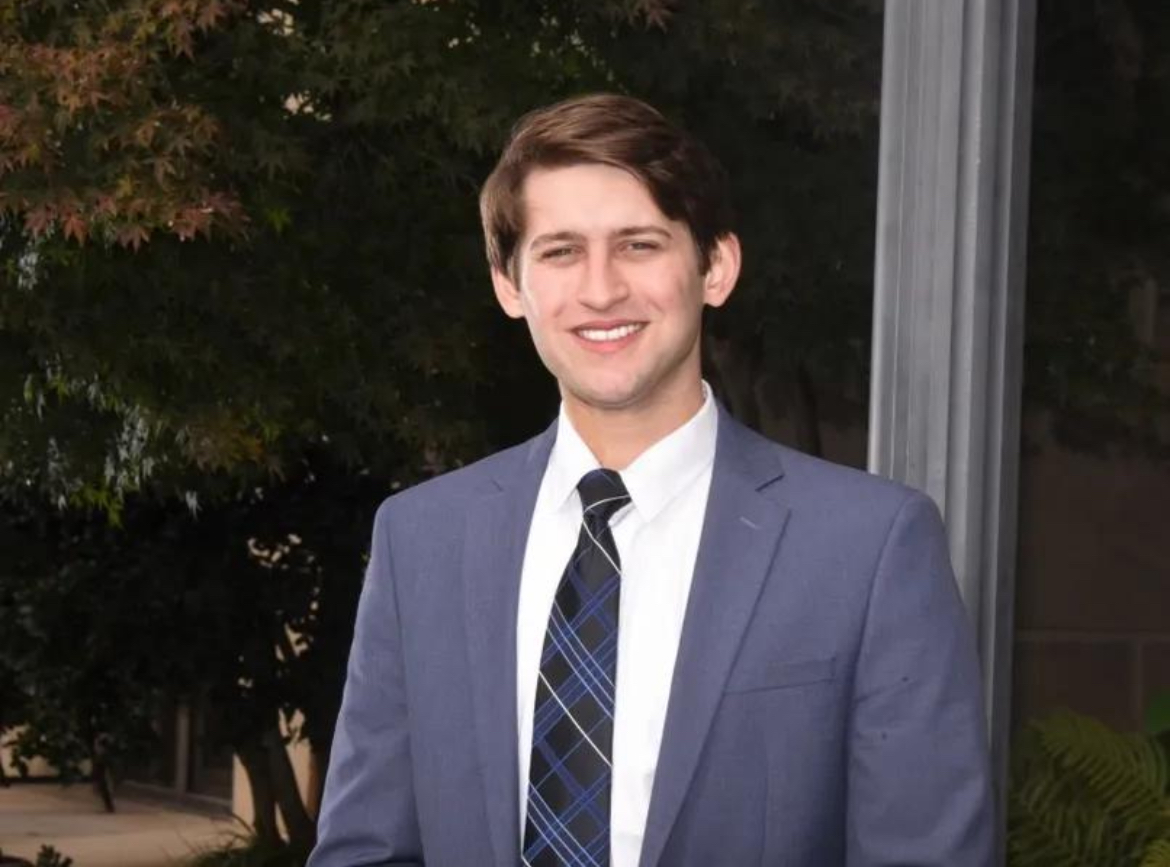 Alex in formal attire