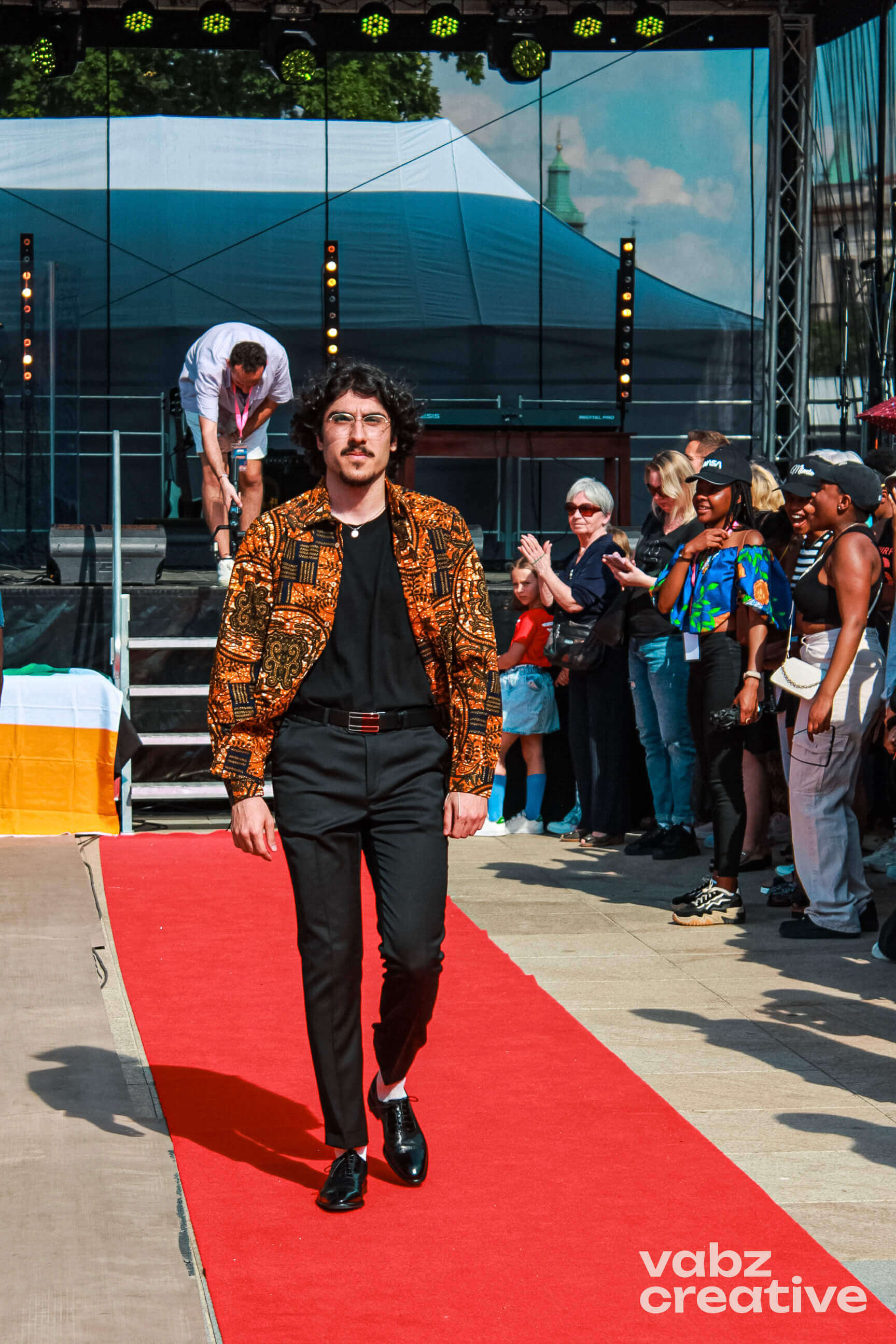 Man in orange patterned jacket