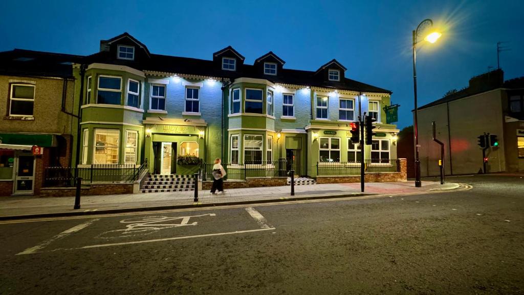 Tastebuds restaurant exterior at night