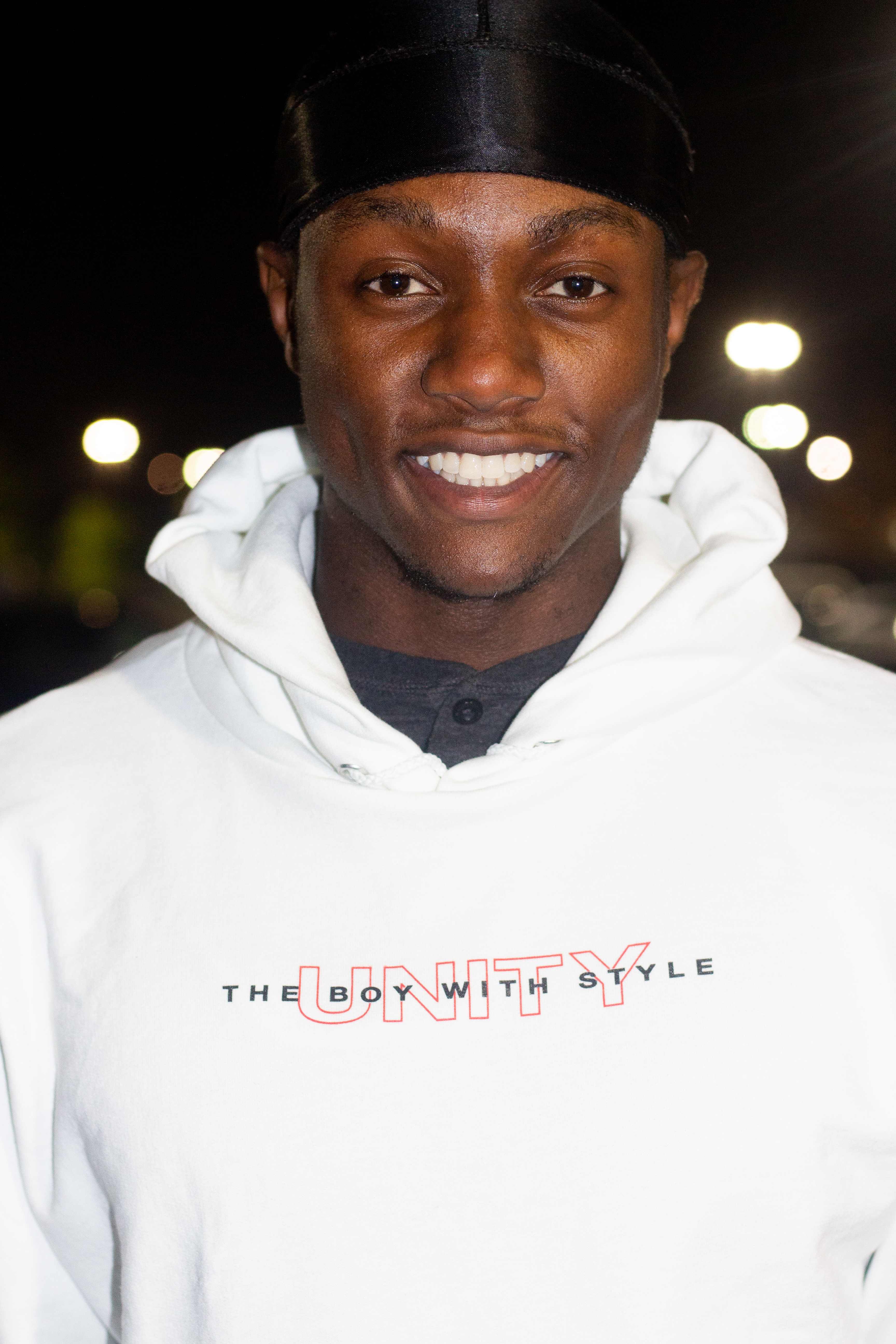 Man smiling at night