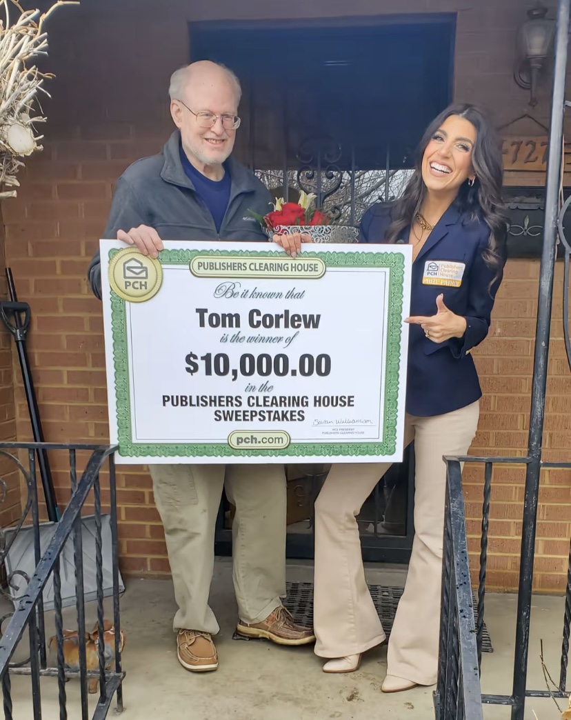 Tom Corlew with PCH representative holding ceremonial check for $10,000