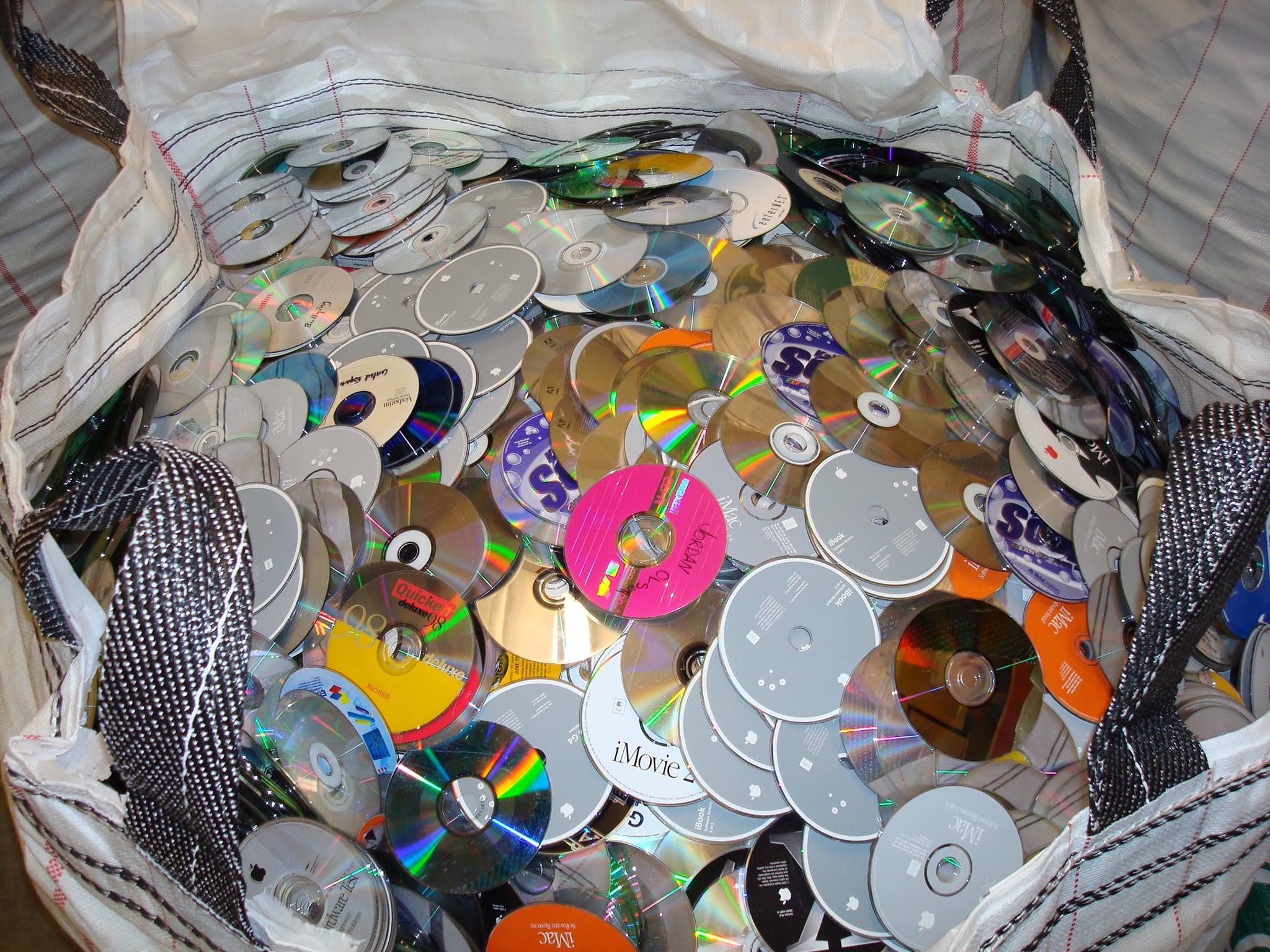 Collection of various optical discs ready for recycling