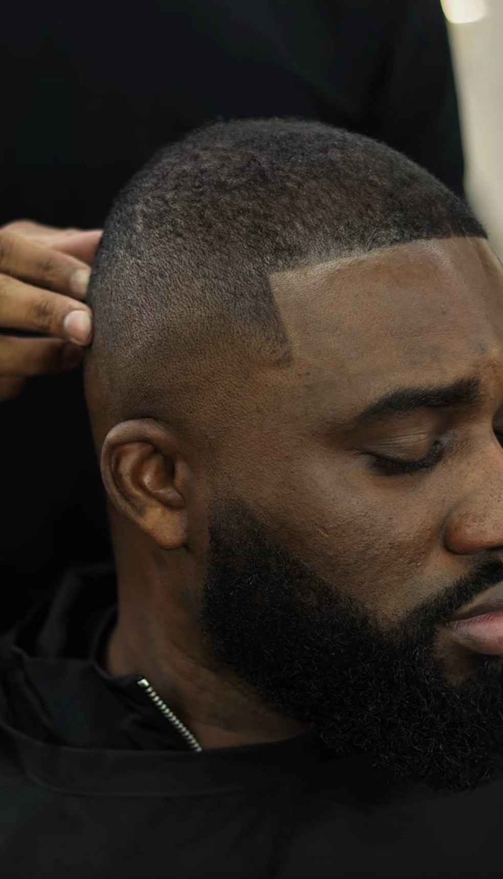 Precision skin fade with beard lineup